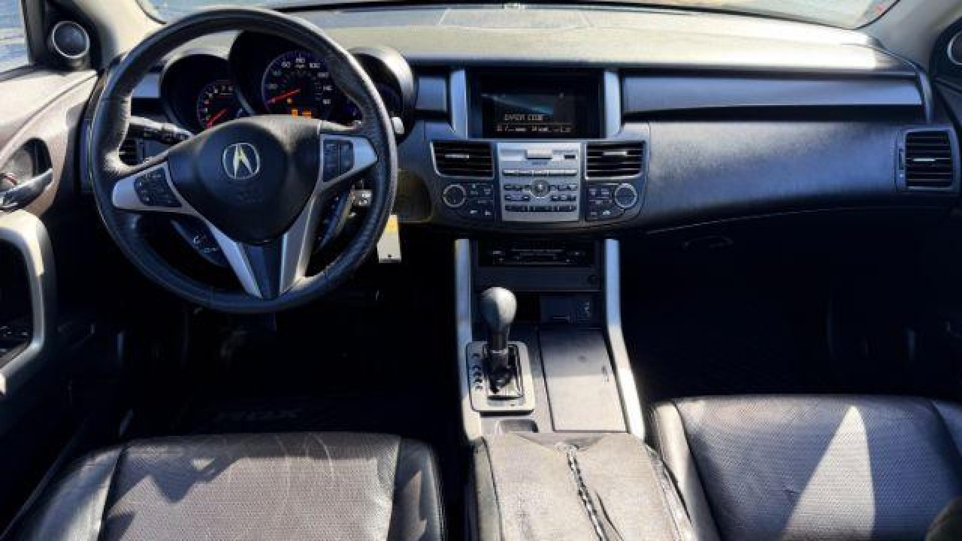 2011 White Acura RDX 5-Spd AT (5J8TB2H2XBA) with an 2.3L L4 DOHC 16V engine, 5-Speed Automatic transmission, located at 1806 Veterans Memorial Hwy SW, Austell, GA, 30168, (770) 944-9558, 33.817959, -84.606987 - Photo#9