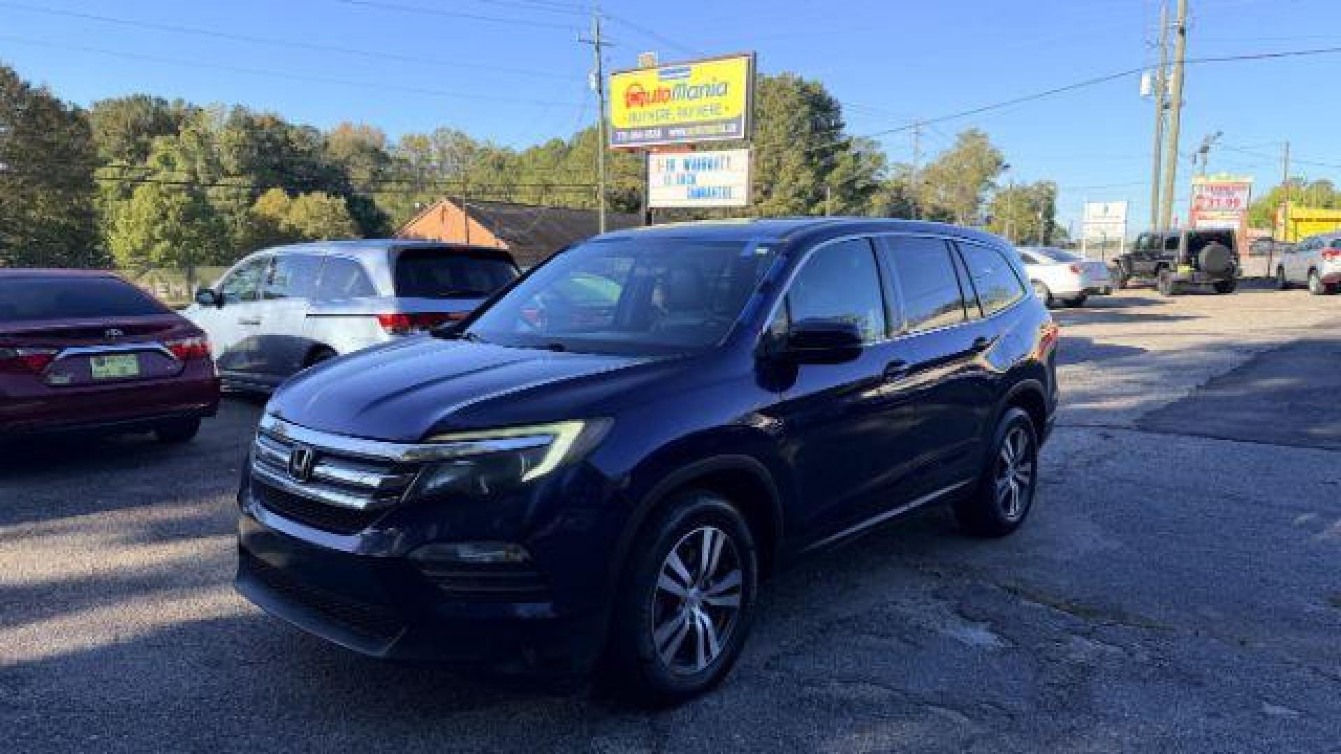 2016 Blue Honda Pilot EX 2WD (5FNYF5H35GB) with an 3.5L V6 SOHC 24V engine, 6-Speed Automatic transmission, located at 1806 Veterans Memorial Hwy SW, Austell, GA, 30168, (770) 944-9558, 33.817959, -84.606987 - Photo#0