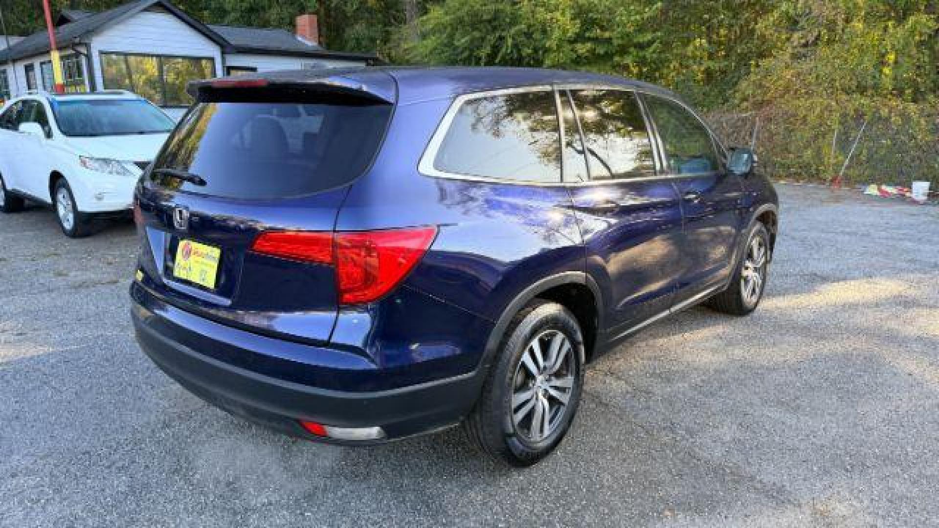 2016 Blue Honda Pilot EX 2WD (5FNYF5H35GB) with an 3.5L V6 SOHC 24V engine, 6-Speed Automatic transmission, located at 1806 Veterans Memorial Hwy SW, Austell, GA, 30168, (770) 944-9558, 33.817959, -84.606987 - Photo#3