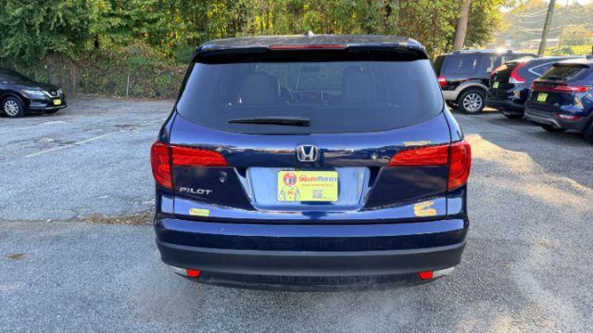 2016 Blue Honda Pilot EX 2WD (5FNYF5H35GB) with an 3.5L V6 SOHC 24V engine, 6-Speed Automatic transmission, located at 1806 Veterans Memorial Hwy SW, Austell, GA, 30168, (770) 944-9558, 33.817959, -84.606987 - Photo#4