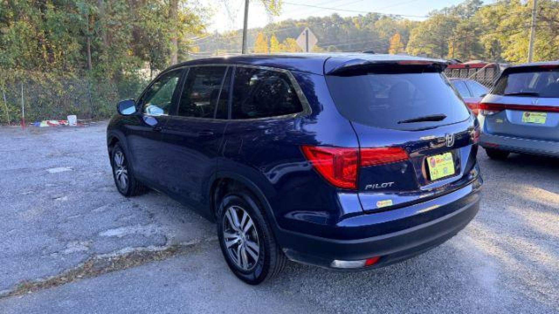 2016 Blue Honda Pilot EX 2WD (5FNYF5H35GB) with an 3.5L V6 SOHC 24V engine, 6-Speed Automatic transmission, located at 1806 Veterans Memorial Hwy SW, Austell, GA, 30168, (770) 944-9558, 33.817959, -84.606987 - Photo#5
