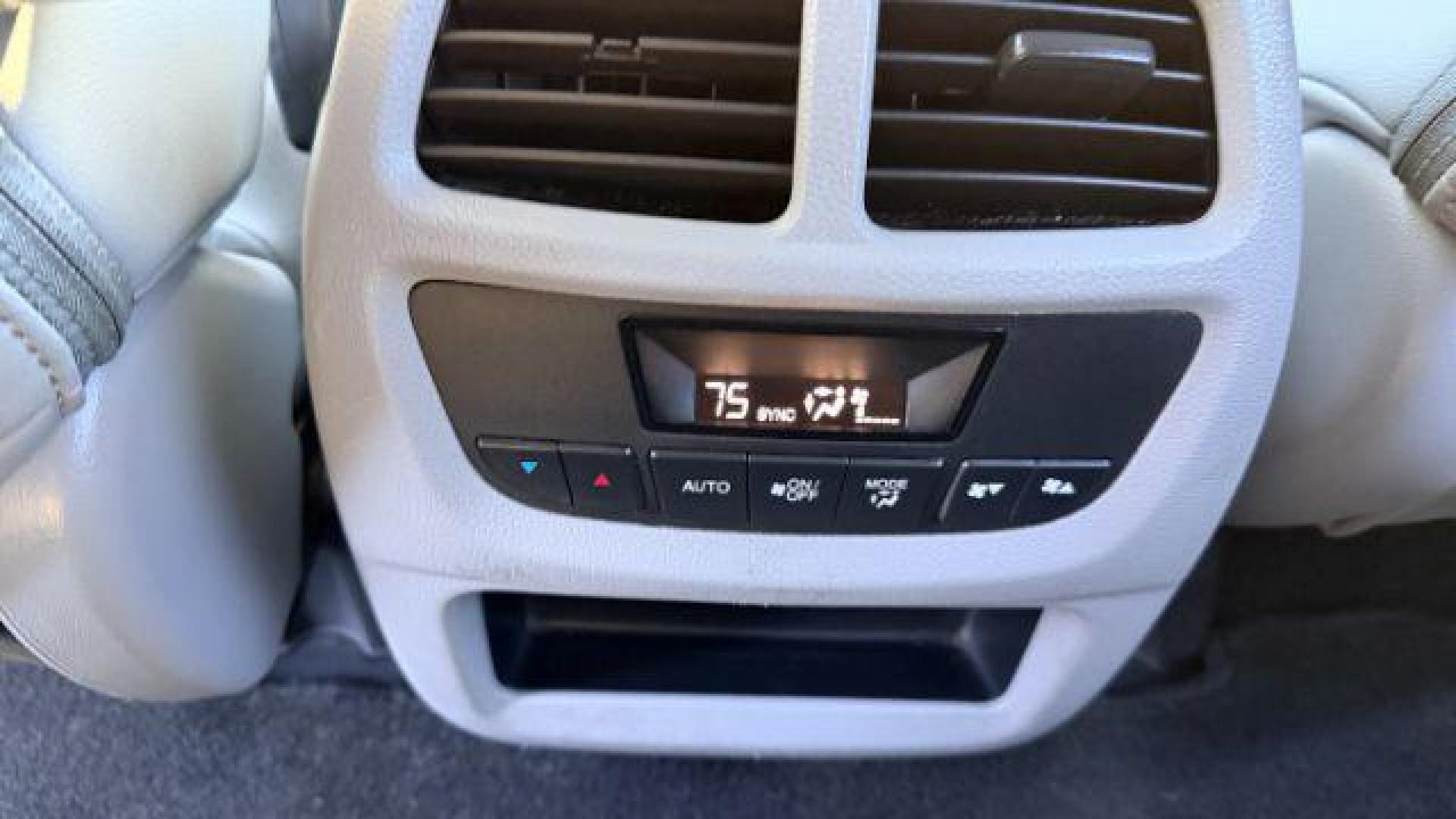 2016 Blue Honda Pilot EX 2WD (5FNYF5H35GB) with an 3.5L V6 SOHC 24V engine, 6-Speed Automatic transmission, located at 1806 Veterans Memorial Hwy SW, Austell, GA, 30168, (770) 944-9558, 33.817959, -84.606987 - Photo#8