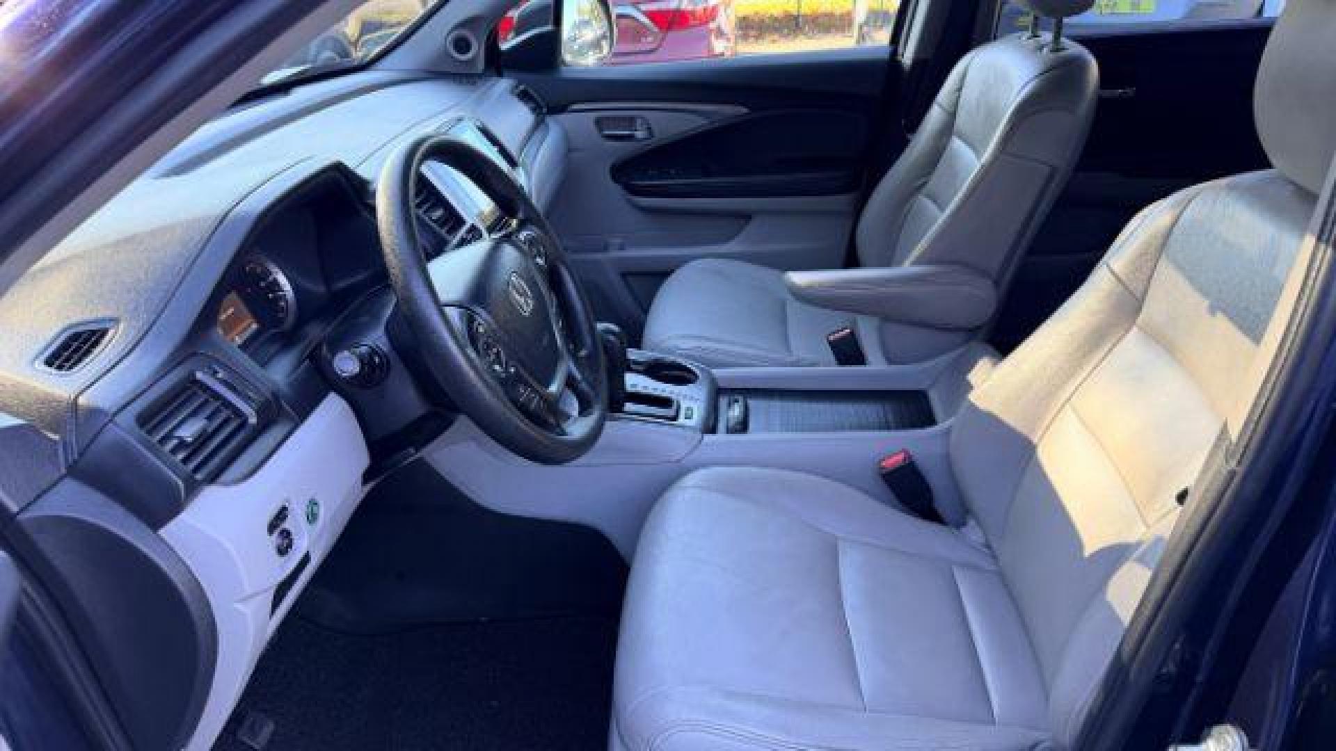 2016 Blue Honda Pilot EX 2WD (5FNYF5H35GB) with an 3.5L V6 SOHC 24V engine, 6-Speed Automatic transmission, located at 1806 Veterans Memorial Hwy SW, Austell, GA, 30168, (770) 944-9558, 33.817959, -84.606987 - Photo#10