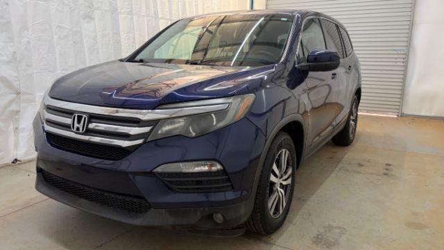 2016 Blue Honda Pilot EX 2WD (5FNYF5H35GB) with an 3.5L V6 SOHC 24V engine, 6-Speed Automatic transmission, located at 1806 Veterans Memorial Hwy SW, Austell, GA, 30168, (770) 944-9558, 33.817959, -84.606987 - Photo#0