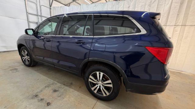 2016 Blue Honda Pilot EX 2WD (5FNYF5H35GB) with an 3.5L V6 SOHC 24V engine, 6-Speed Automatic transmission, located at 1806 Veterans Memorial Hwy SW, Austell, GA, 30168, (770) 944-9558, 33.817959, -84.606987 - Photo#1