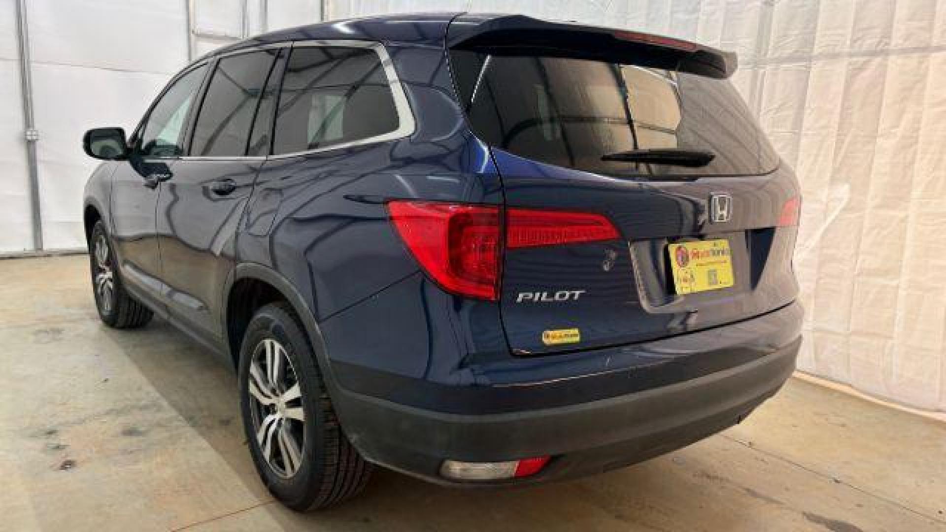 2016 Blue Honda Pilot EX 2WD (5FNYF5H35GB) with an 3.5L V6 SOHC 24V engine, 6-Speed Automatic transmission, located at 1806 Veterans Memorial Hwy SW, Austell, GA, 30168, (770) 944-9558, 33.817959, -84.606987 - Photo#2