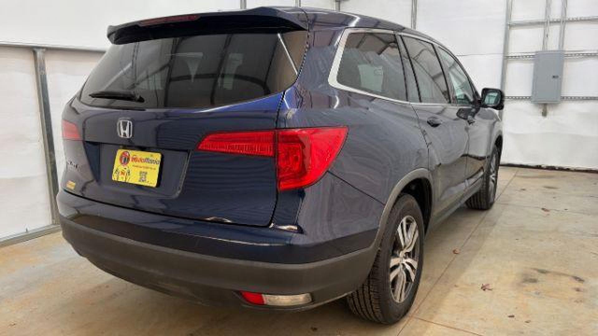 2016 Blue Honda Pilot EX 2WD (5FNYF5H35GB) with an 3.5L V6 SOHC 24V engine, 6-Speed Automatic transmission, located at 1806 Veterans Memorial Hwy SW, Austell, GA, 30168, (770) 944-9558, 33.817959, -84.606987 - Photo#4