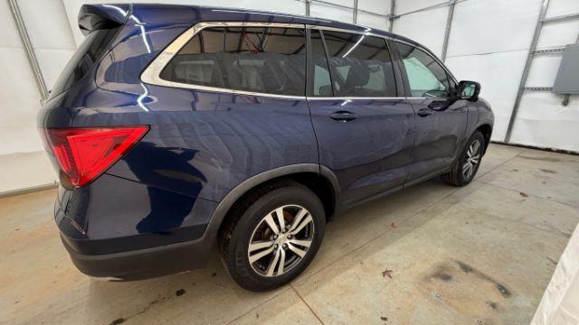 2016 Blue Honda Pilot EX 2WD (5FNYF5H35GB) with an 3.5L V6 SOHC 24V engine, 6-Speed Automatic transmission, located at 1806 Veterans Memorial Hwy SW, Austell, GA, 30168, (770) 944-9558, 33.817959, -84.606987 - Photo#5