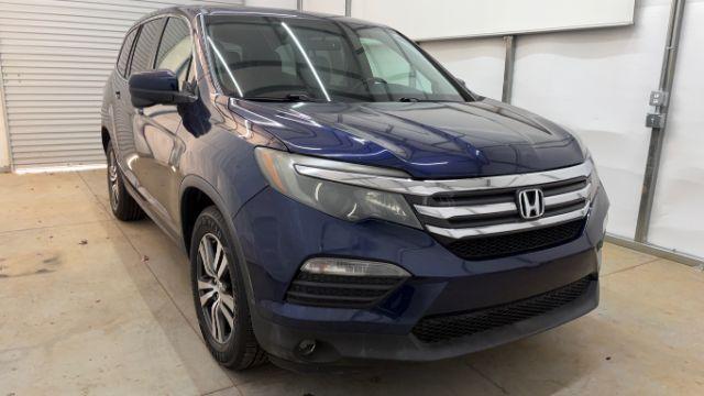 2016 Blue Honda Pilot EX 2WD (5FNYF5H35GB) with an 3.5L V6 SOHC 24V engine, 6-Speed Automatic transmission, located at 1806 Veterans Memorial Hwy SW, Austell, GA, 30168, (770) 944-9558, 33.817959, -84.606987 - Photo#7