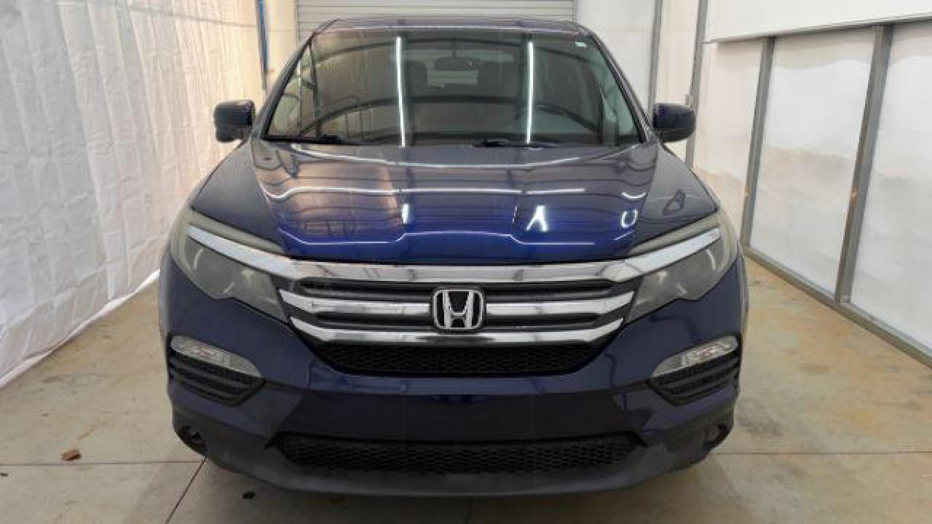 2016 Blue Honda Pilot EX 2WD (5FNYF5H35GB) with an 3.5L V6 SOHC 24V engine, 6-Speed Automatic transmission, located at 1806 Veterans Memorial Hwy SW, Austell, GA, 30168, (770) 944-9558, 33.817959, -84.606987 - Photo#8