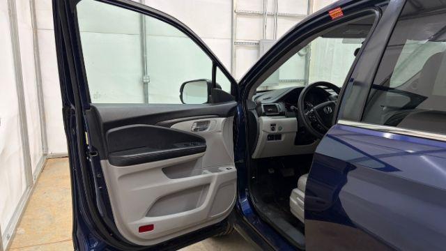 2016 Blue Honda Pilot EX 2WD (5FNYF5H35GB) with an 3.5L V6 SOHC 24V engine, 6-Speed Automatic transmission, located at 1806 Veterans Memorial Hwy SW, Austell, GA, 30168, (770) 944-9558, 33.817959, -84.606987 - Photo#9