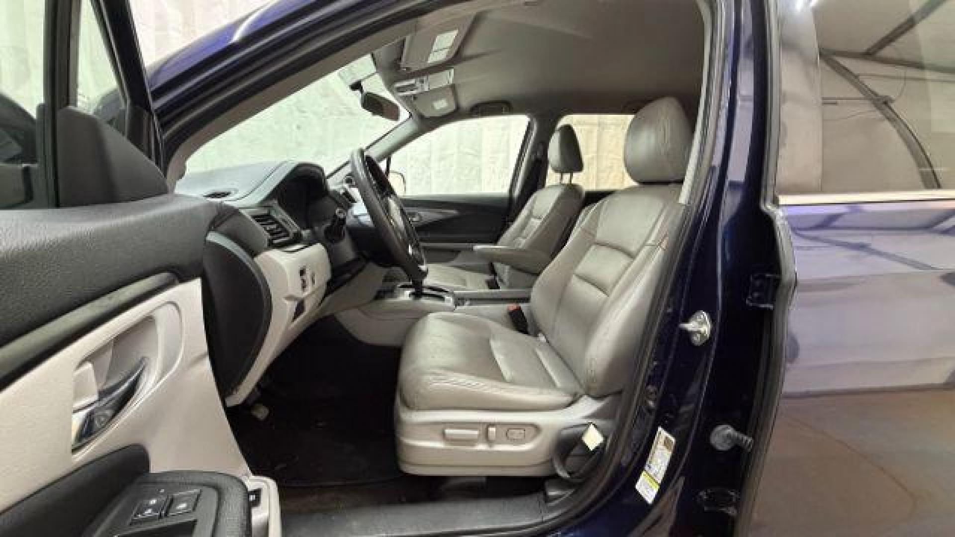 2016 Blue Honda Pilot EX 2WD (5FNYF5H35GB) with an 3.5L V6 SOHC 24V engine, 6-Speed Automatic transmission, located at 1806 Veterans Memorial Hwy SW, Austell, GA, 30168, (770) 944-9558, 33.817959, -84.606987 - Photo#12