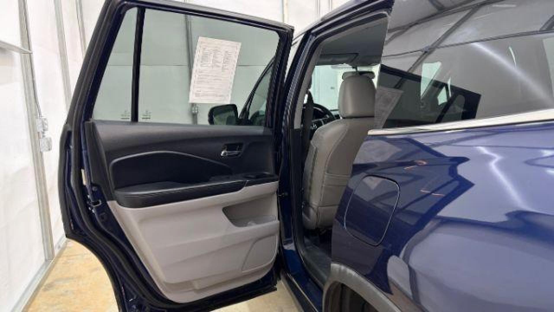 2016 Blue Honda Pilot EX 2WD (5FNYF5H35GB) with an 3.5L V6 SOHC 24V engine, 6-Speed Automatic transmission, located at 1806 Veterans Memorial Hwy SW, Austell, GA, 30168, (770) 944-9558, 33.817959, -84.606987 - Photo#13