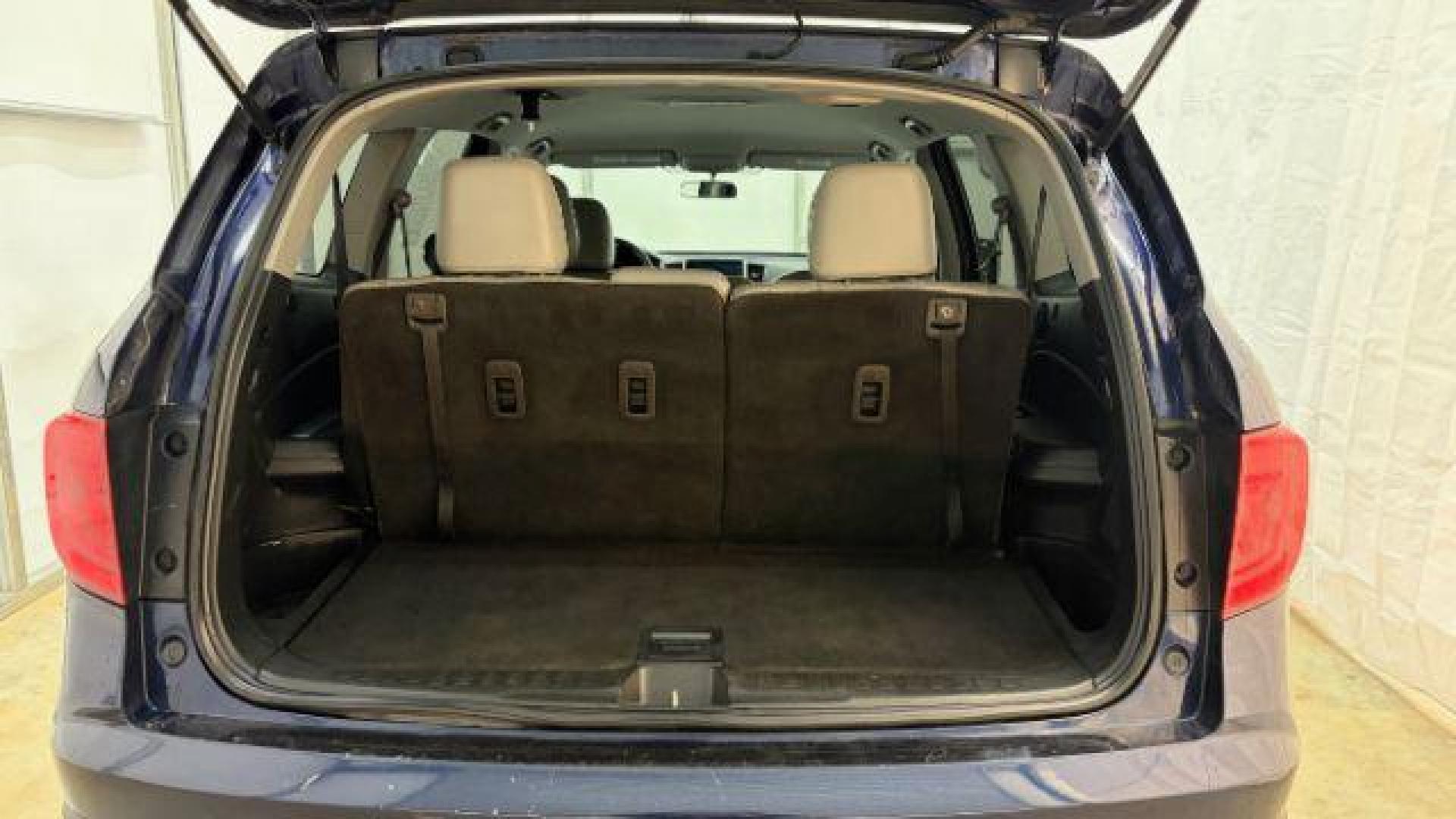 2016 Blue Honda Pilot EX 2WD (5FNYF5H35GB) with an 3.5L V6 SOHC 24V engine, 6-Speed Automatic transmission, located at 1806 Veterans Memorial Hwy SW, Austell, GA, 30168, (770) 944-9558, 33.817959, -84.606987 - Photo#15