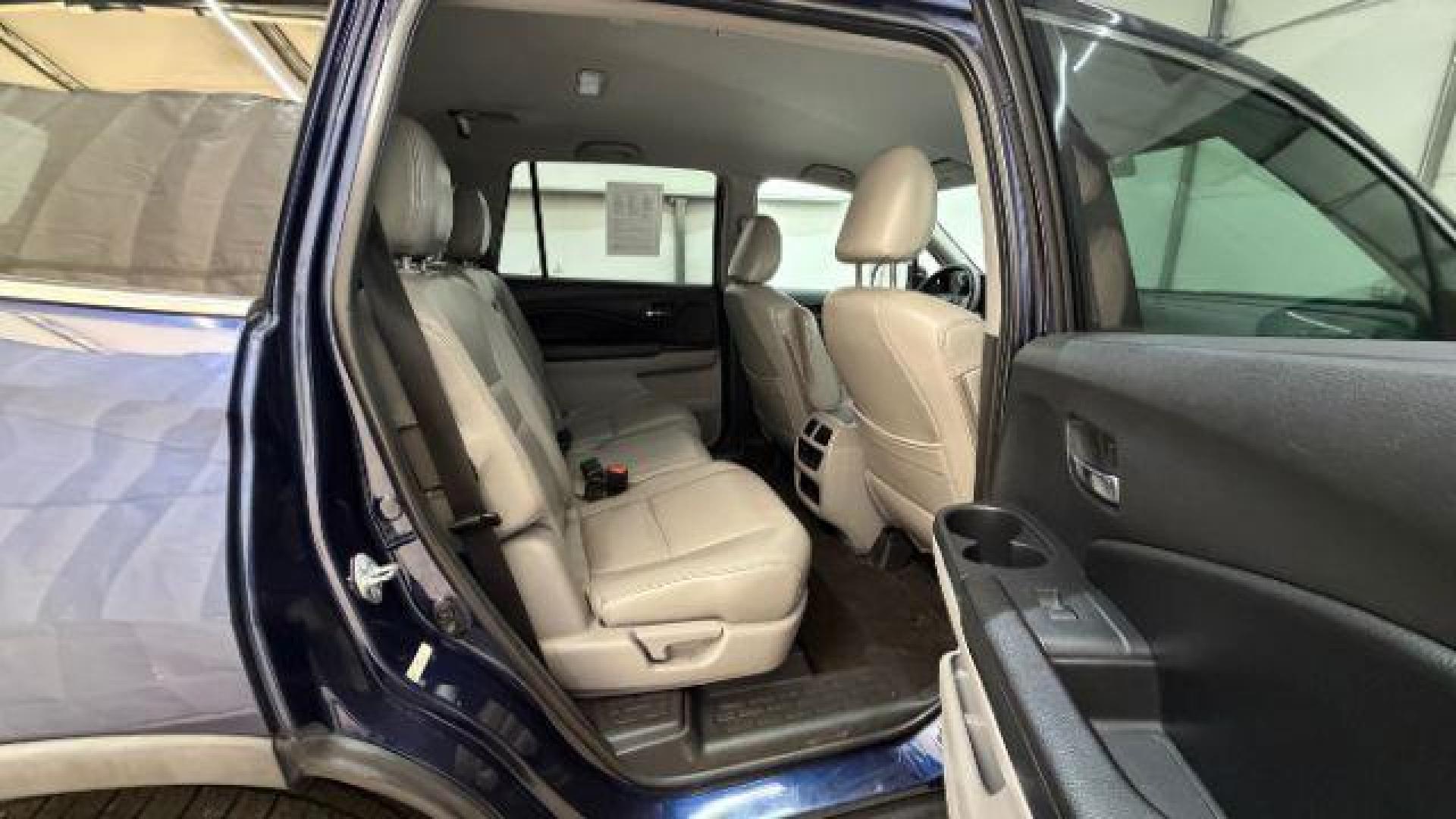 2016 Blue Honda Pilot EX 2WD (5FNYF5H35GB) with an 3.5L V6 SOHC 24V engine, 6-Speed Automatic transmission, located at 1806 Veterans Memorial Hwy SW, Austell, GA, 30168, (770) 944-9558, 33.817959, -84.606987 - Photo#17