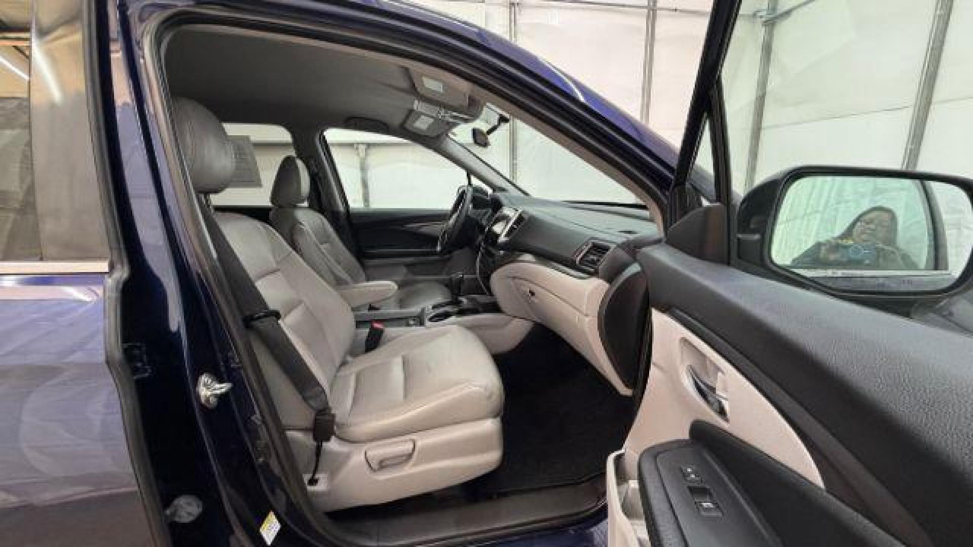 2016 Blue Honda Pilot EX 2WD (5FNYF5H35GB) with an 3.5L V6 SOHC 24V engine, 6-Speed Automatic transmission, located at 1806 Veterans Memorial Hwy SW, Austell, GA, 30168, (770) 944-9558, 33.817959, -84.606987 - Photo#18