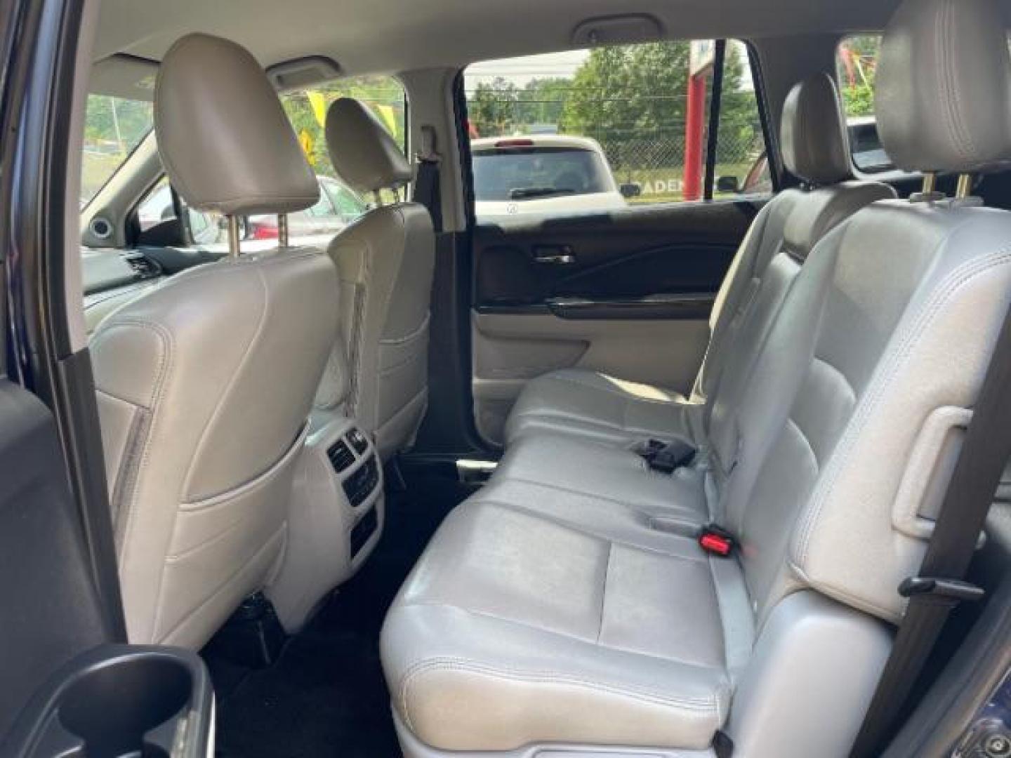 2016 Blue Honda Pilot EX 2WD (5FNYF5H35GB) with an 3.5L V6 SOHC 24V engine, 6-Speed Automatic transmission, located at 1806 Veterans Memorial Hwy SW, Austell, GA, 30168, (770) 944-9558, 33.817959, -84.606987 - Photo#10
