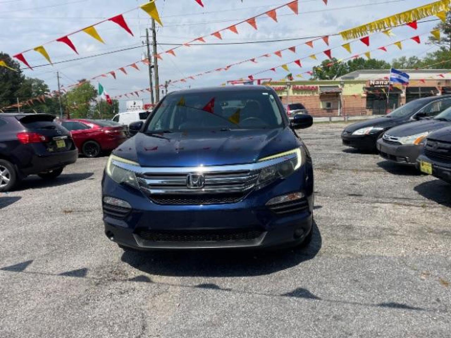 2016 Blue Honda Pilot EX 2WD (5FNYF5H35GB) with an 3.5L V6 SOHC 24V engine, 6-Speed Automatic transmission, located at 1806 Veterans Memorial Hwy SW, Austell, GA, 30168, (770) 944-9558, 33.817959, -84.606987 - Photo#1