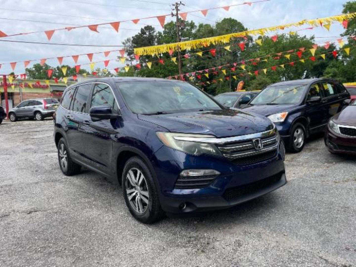 2016 Blue Honda Pilot EX 2WD (5FNYF5H35GB) with an 3.5L V6 SOHC 24V engine, 6-Speed Automatic transmission, located at 1806 Veterans Memorial Hwy SW, Austell, GA, 30168, (770) 944-9558, 33.817959, -84.606987 - Photo#3
