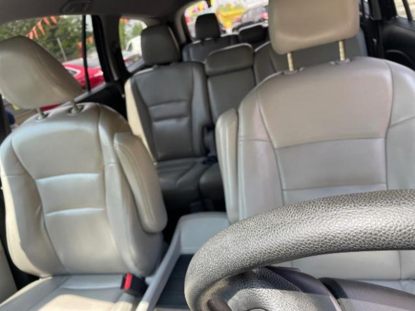 2016 Blue Honda Pilot EX 2WD (5FNYF5H35GB) with an 3.5L V6 SOHC 24V engine, 6-Speed Automatic transmission, located at 1806 Veterans Memorial Hwy SW, Austell, GA, 30168, (770) 944-9558, 33.817959, -84.606987 - Photo#6