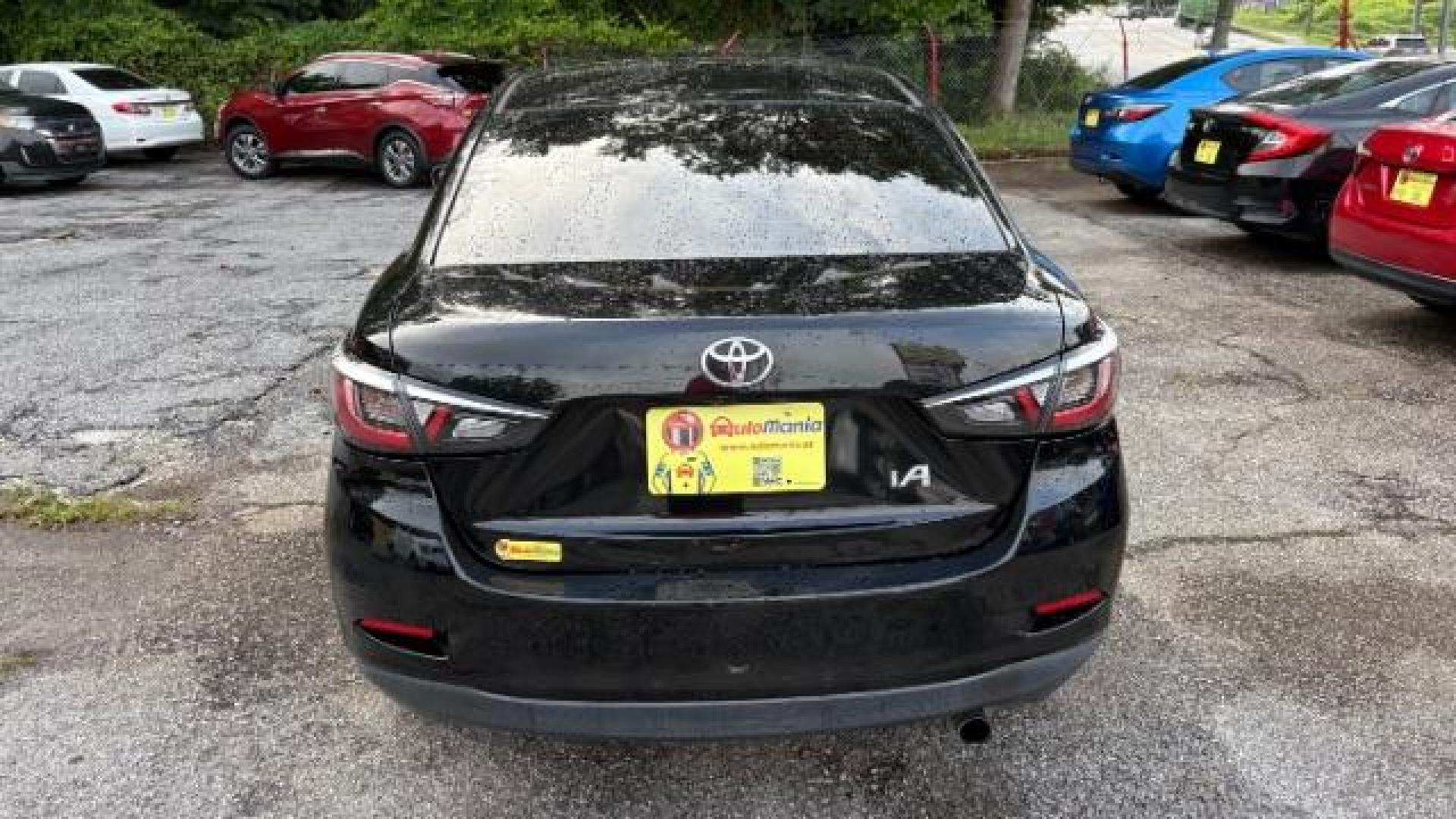 2018 Black Toyota Yaris iA 6A (3MYDLBYVXJY) with an 1.5L L4 DOHC 16V engine, 6-Speed Automatic transmission, located at 1806 Veterans Memorial Hwy SW, Austell, GA, 30168, (770) 944-9558, 33.817959, -84.606987 - Photo#5