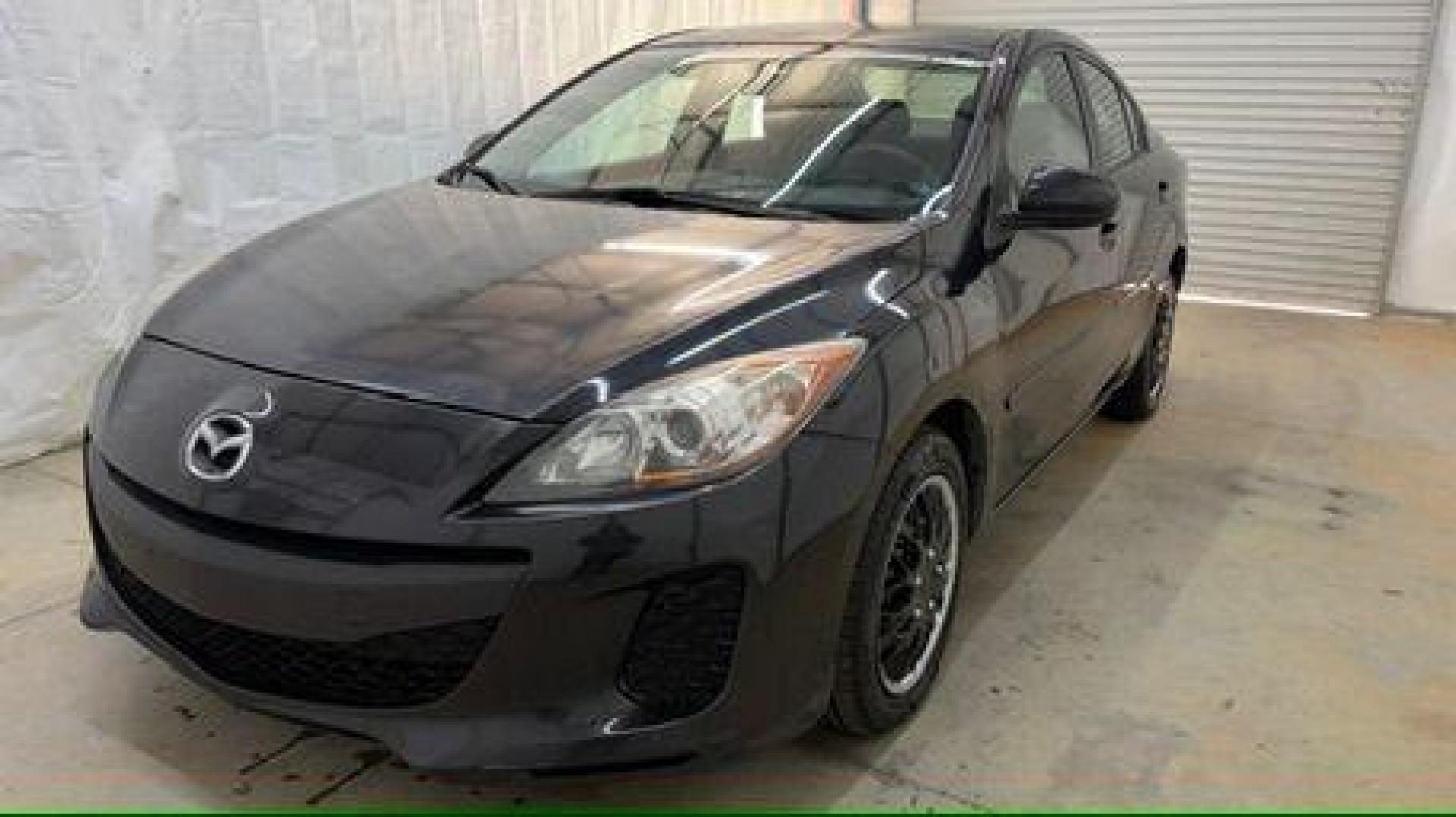2013 Black Mazda MAZDA3 i SV AT 4-Door (JM1BL1TF0D1) with an 2.0L L4 DOHC 16V engine, 5-Speed Automatic transmission, located at 1806 Veterans Memorial Hwy SW, Austell, GA, 30168, (770) 944-9558, 33.817959, -84.606987 - Photo#0