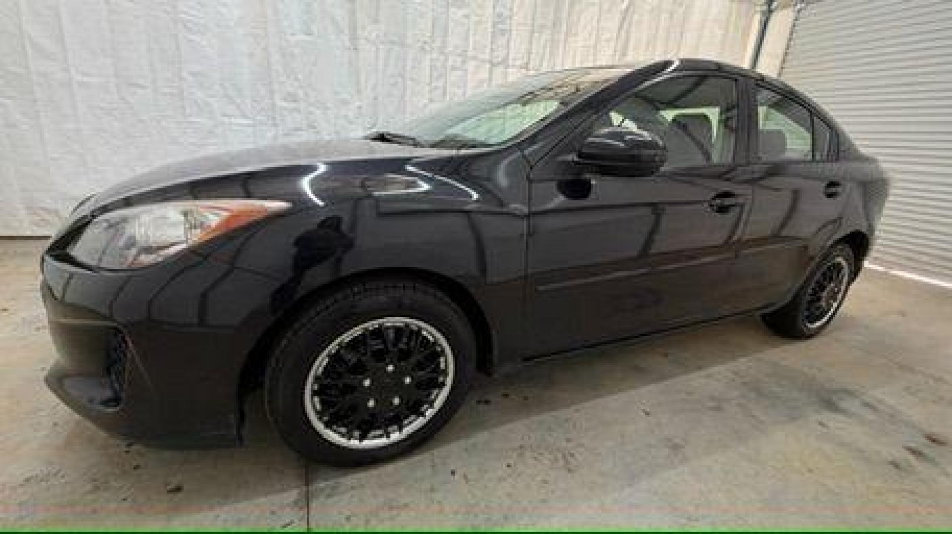 2013 Black Mazda MAZDA3 i SV AT 4-Door (JM1BL1TF0D1) with an 2.0L L4 DOHC 16V engine, 5-Speed Automatic transmission, located at 1806 Veterans Memorial Hwy SW, Austell, GA, 30168, (770) 944-9558, 33.817959, -84.606987 - Photo#1