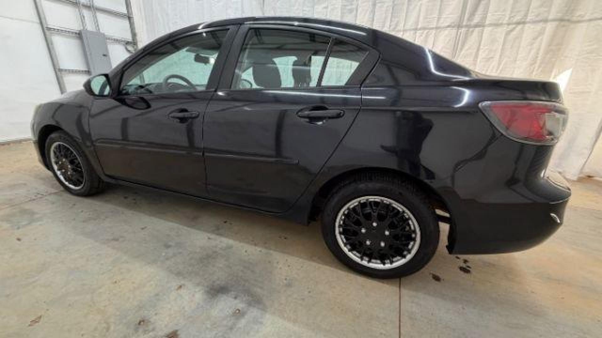 2013 Black Mazda MAZDA3 i SV AT 4-Door (JM1BL1TF0D1) with an 2.0L L4 DOHC 16V engine, 5-Speed Automatic transmission, located at 1806 Veterans Memorial Hwy SW, Austell, GA, 30168, (770) 944-9558, 33.817959, -84.606987 - Photo#2