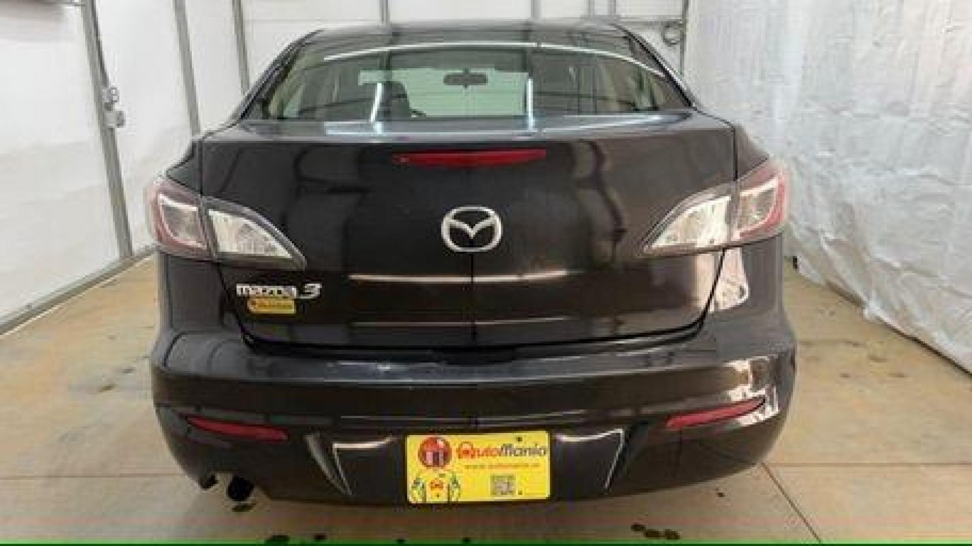 2013 Black Mazda MAZDA3 i SV AT 4-Door (JM1BL1TF0D1) with an 2.0L L4 DOHC 16V engine, 5-Speed Automatic transmission, located at 1806 Veterans Memorial Hwy SW, Austell, GA, 30168, (770) 944-9558, 33.817959, -84.606987 - Photo#4