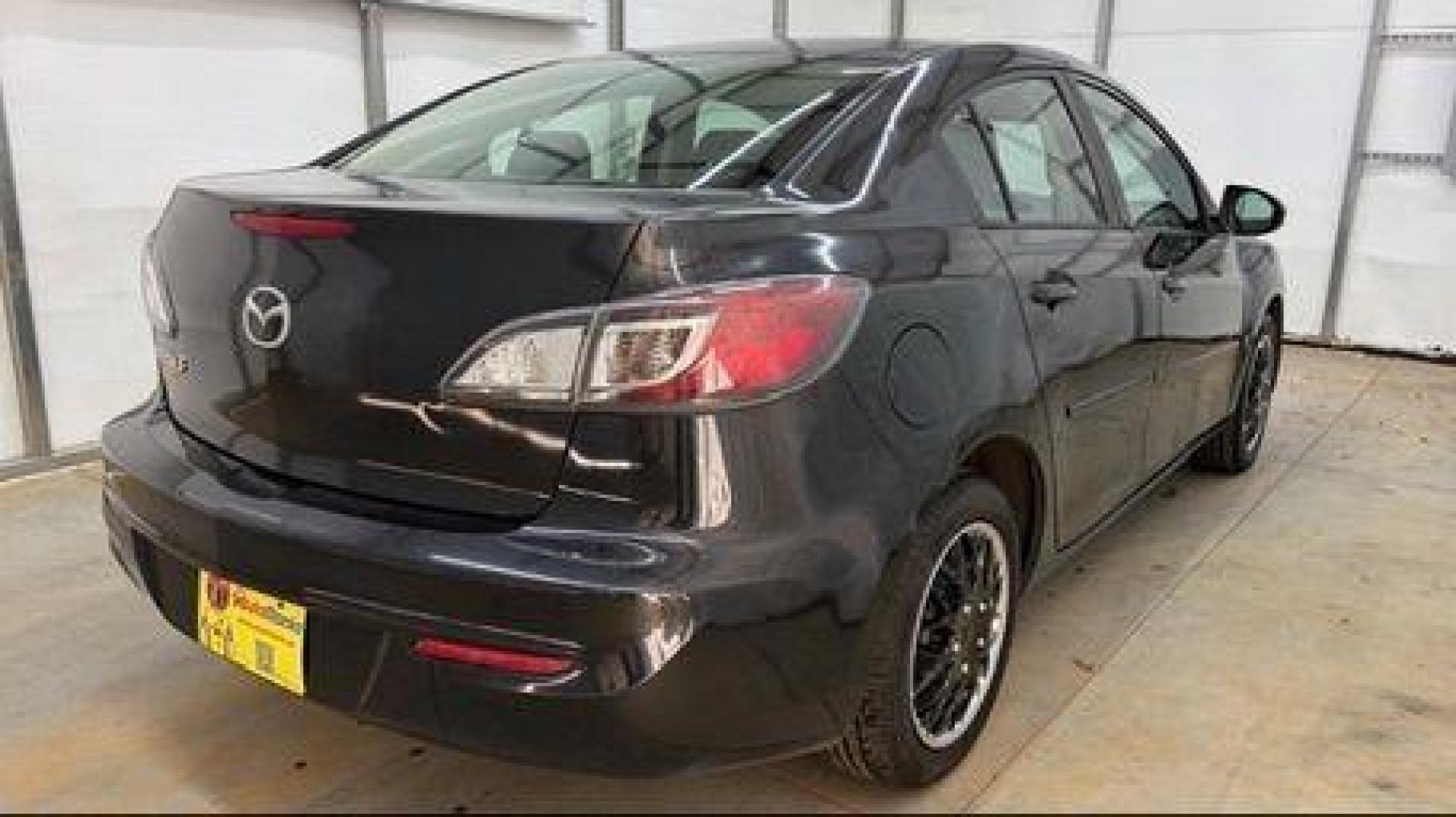 2013 Black Mazda MAZDA3 i SV AT 4-Door (JM1BL1TF0D1) with an 2.0L L4 DOHC 16V engine, 5-Speed Automatic transmission, located at 1806 Veterans Memorial Hwy SW, Austell, GA, 30168, (770) 944-9558, 33.817959, -84.606987 - Photo#5