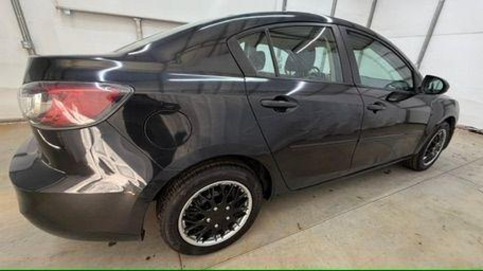 2013 Black Mazda MAZDA3 i SV AT 4-Door (JM1BL1TF0D1) with an 2.0L L4 DOHC 16V engine, 5-Speed Automatic transmission, located at 1806 Veterans Memorial Hwy SW, Austell, GA, 30168, (770) 944-9558, 33.817959, -84.606987 - Photo#6