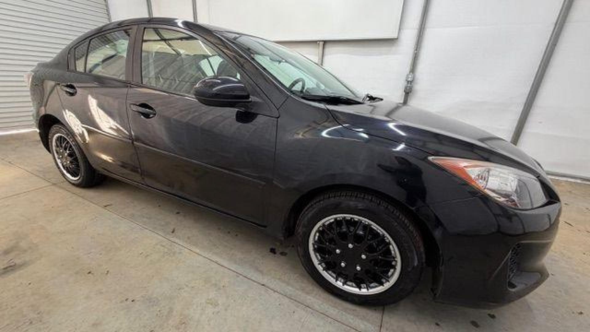 2013 Black Mazda MAZDA3 i SV AT 4-Door (JM1BL1TF0D1) with an 2.0L L4 DOHC 16V engine, 5-Speed Automatic transmission, located at 1806 Veterans Memorial Hwy SW, Austell, GA, 30168, (770) 944-9558, 33.817959, -84.606987 - Photo#7