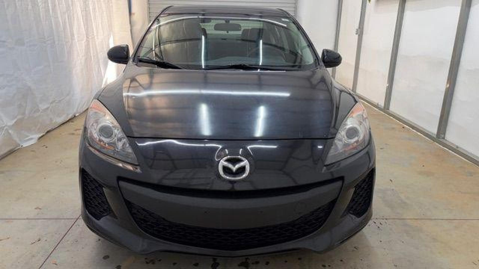 2013 Black Mazda MAZDA3 i SV AT 4-Door (JM1BL1TF0D1) with an 2.0L L4 DOHC 16V engine, 5-Speed Automatic transmission, located at 1806 Veterans Memorial Hwy SW, Austell, GA, 30168, (770) 944-9558, 33.817959, -84.606987 - Photo#9