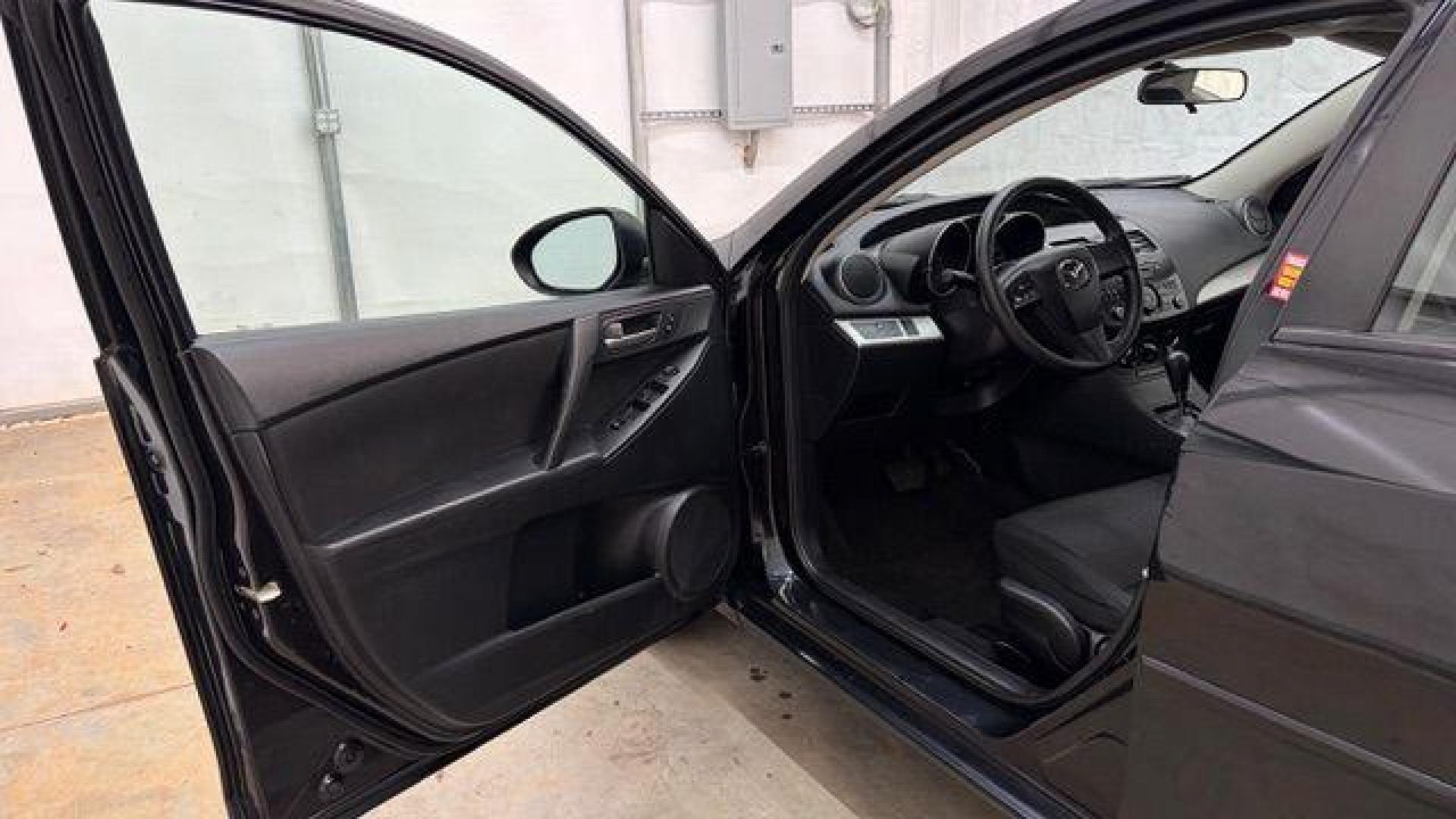 2013 Black Mazda MAZDA3 i SV AT 4-Door (JM1BL1TF0D1) with an 2.0L L4 DOHC 16V engine, 5-Speed Automatic transmission, located at 1806 Veterans Memorial Hwy SW, Austell, GA, 30168, (770) 944-9558, 33.817959, -84.606987 - Photo#10