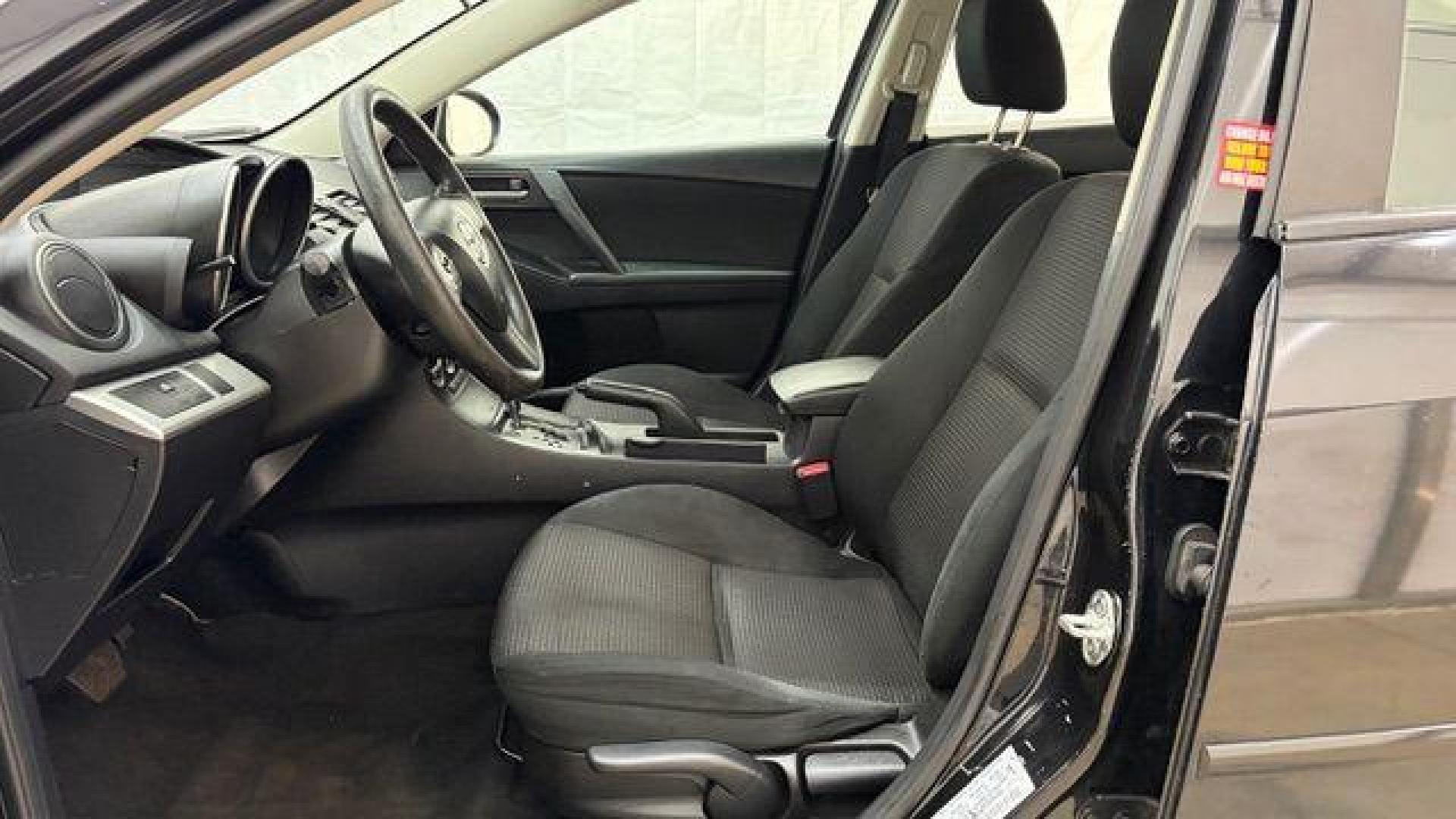 2013 Black Mazda MAZDA3 i SV AT 4-Door (JM1BL1TF0D1) with an 2.0L L4 DOHC 16V engine, 5-Speed Automatic transmission, located at 1806 Veterans Memorial Hwy SW, Austell, GA, 30168, (770) 944-9558, 33.817959, -84.606987 - Photo#11