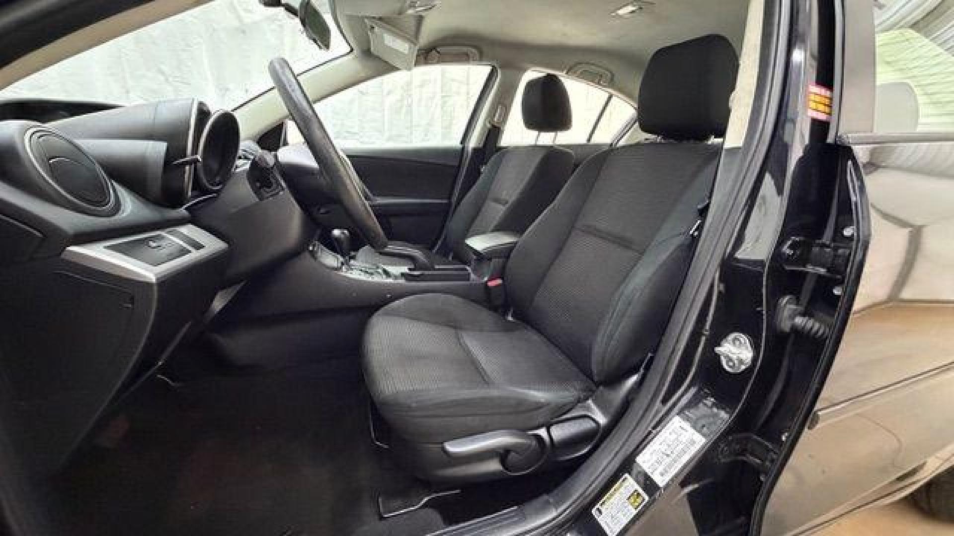 2013 Black Mazda MAZDA3 i SV AT 4-Door (JM1BL1TF0D1) with an 2.0L L4 DOHC 16V engine, 5-Speed Automatic transmission, located at 1806 Veterans Memorial Hwy SW, Austell, GA, 30168, (770) 944-9558, 33.817959, -84.606987 - Photo#12