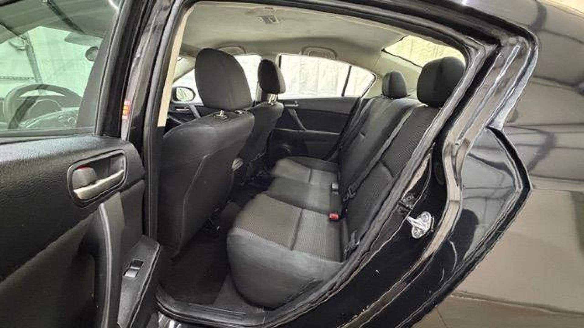 2013 Black Mazda MAZDA3 i SV AT 4-Door (JM1BL1TF0D1) with an 2.0L L4 DOHC 16V engine, 5-Speed Automatic transmission, located at 1806 Veterans Memorial Hwy SW, Austell, GA, 30168, (770) 944-9558, 33.817959, -84.606987 - Photo#14