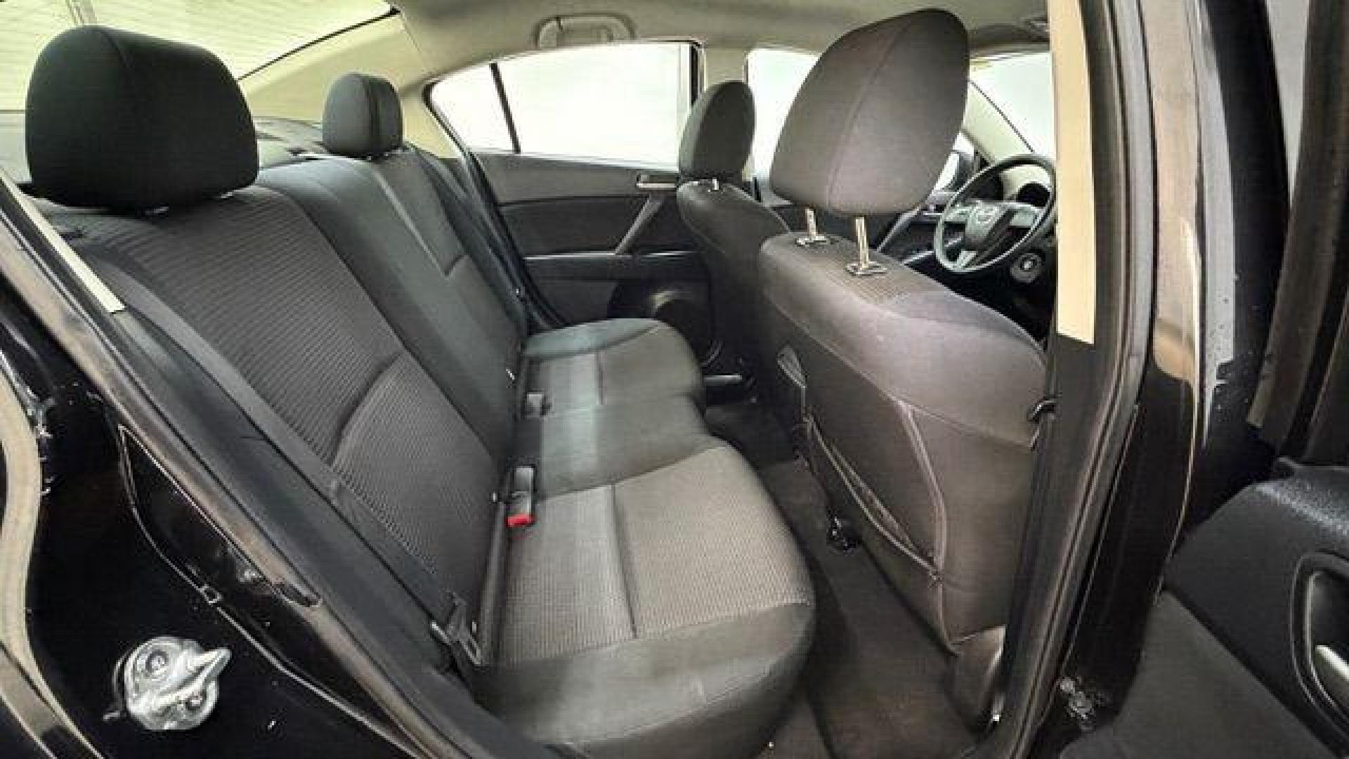 2013 Black Mazda MAZDA3 i SV AT 4-Door (JM1BL1TF0D1) with an 2.0L L4 DOHC 16V engine, 5-Speed Automatic transmission, located at 1806 Veterans Memorial Hwy SW, Austell, GA, 30168, (770) 944-9558, 33.817959, -84.606987 - Photo#16