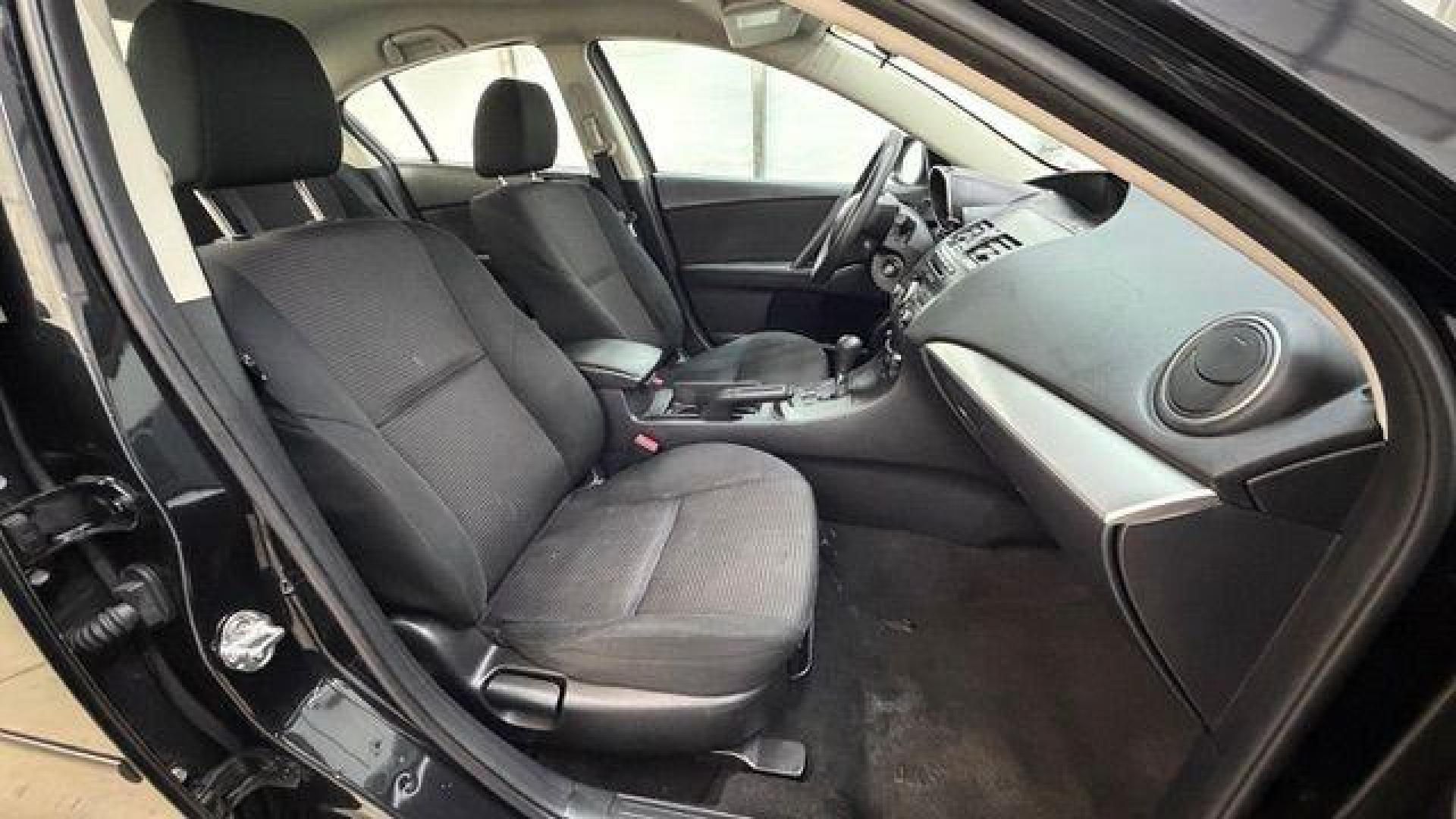 2013 Black Mazda MAZDA3 i SV AT 4-Door (JM1BL1TF0D1) with an 2.0L L4 DOHC 16V engine, 5-Speed Automatic transmission, located at 1806 Veterans Memorial Hwy SW, Austell, GA, 30168, (770) 944-9558, 33.817959, -84.606987 - Photo#17