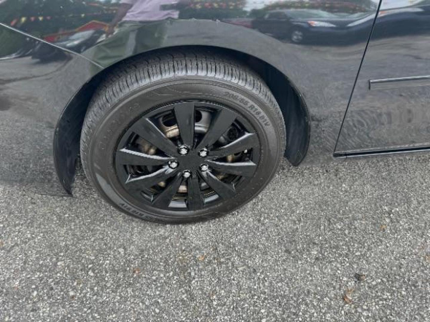 2013 Black Mazda MAZDA3 i SV AT 4-Door (JM1BL1TF0D1) with an 2.0L L4 DOHC 16V engine, 5-Speed Automatic transmission, located at 1806 Veterans Memorial Hwy SW, Austell, GA, 30168, (770) 944-9558, 33.817959, -84.606987 - Photo#17