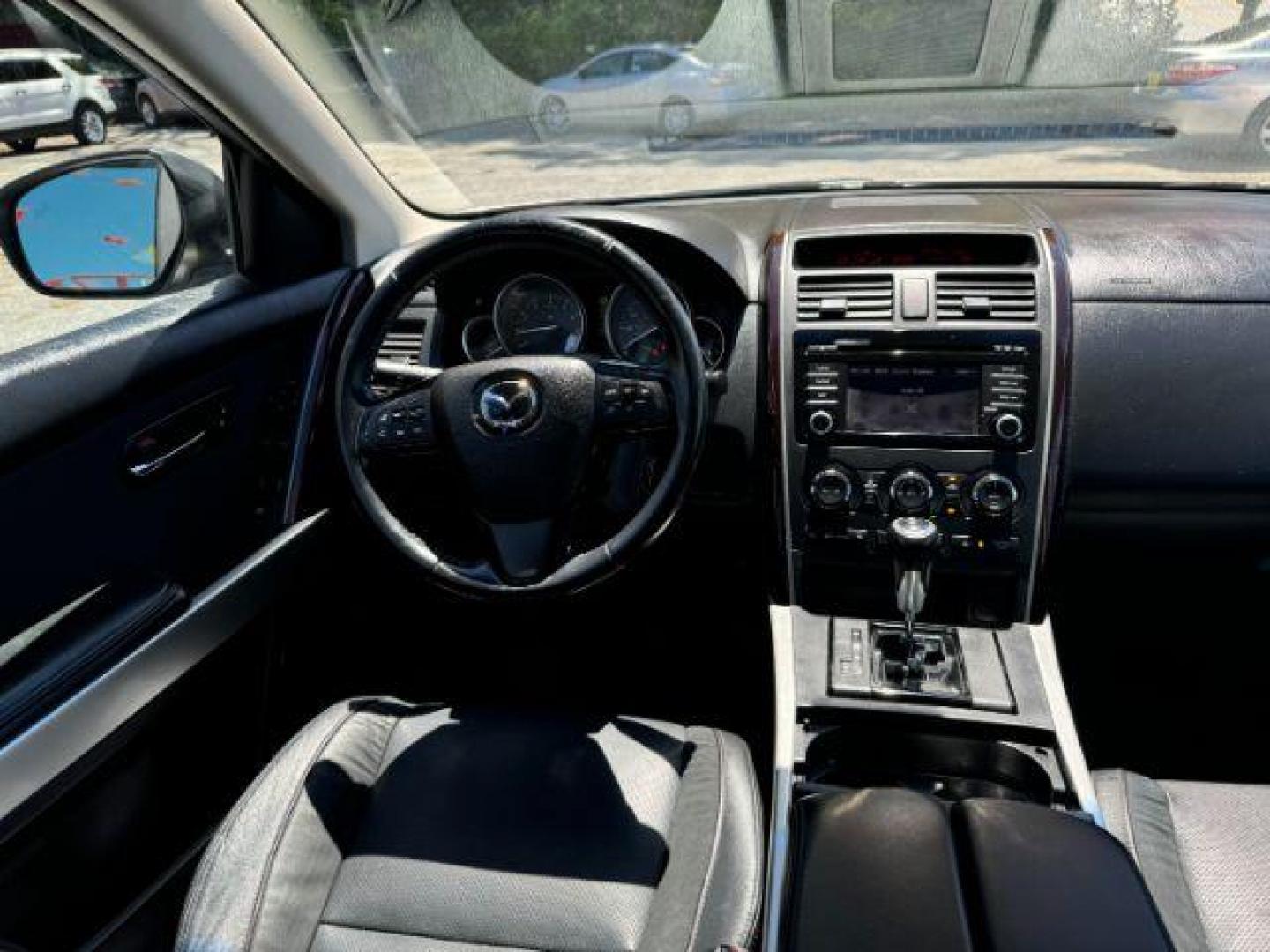 2015 Silver Mazda CX-9 Grand Touring (JM3TB2DAXF0) with an 3.7L V6 DOHC 24V engine, 6-Speed Automatic transmission, located at 1806 Veterans Memorial Hwy SW, Austell, GA, 30168, (770) 944-9558, 33.817959, -84.606987 - Photo#13