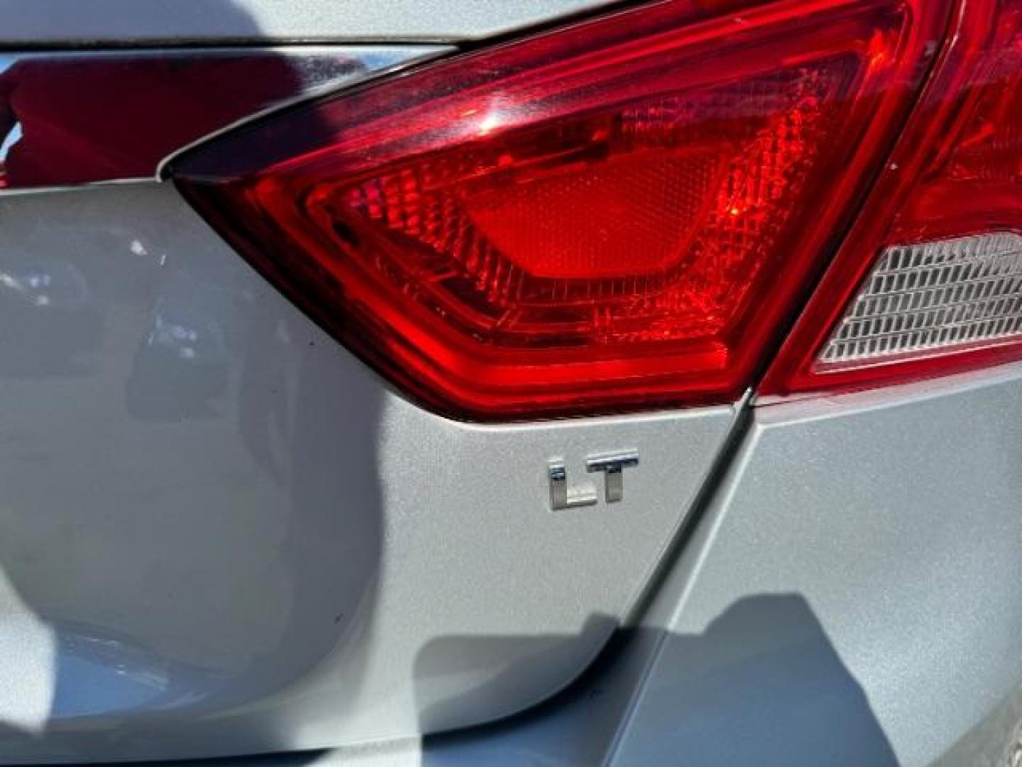2014 Silver Chevrolet Impala 1LT (2G1115SL5E9) with an 2.5L L4 DOHC 16V engine, 6-Speed Automatic transmission, located at 1806 Veterans Memorial Hwy SW, Austell, GA, 30168, (770) 944-9558, 33.817959, -84.606987 - Photo#12