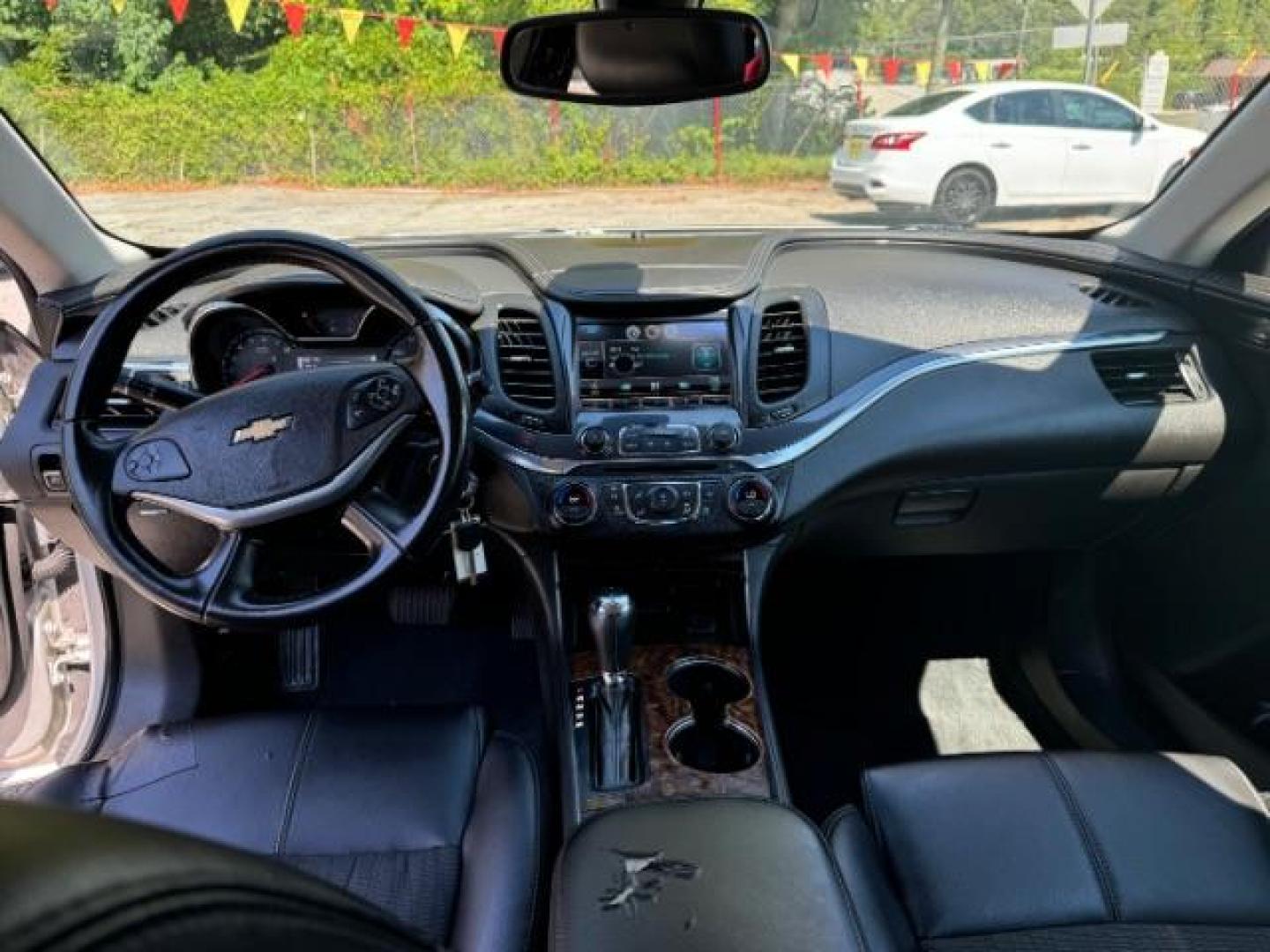 2014 Silver Chevrolet Impala 1LT (2G1115SL5E9) with an 2.5L L4 DOHC 16V engine, 6-Speed Automatic transmission, located at 1806 Veterans Memorial Hwy SW, Austell, GA, 30168, (770) 944-9558, 33.817959, -84.606987 - Photo#16