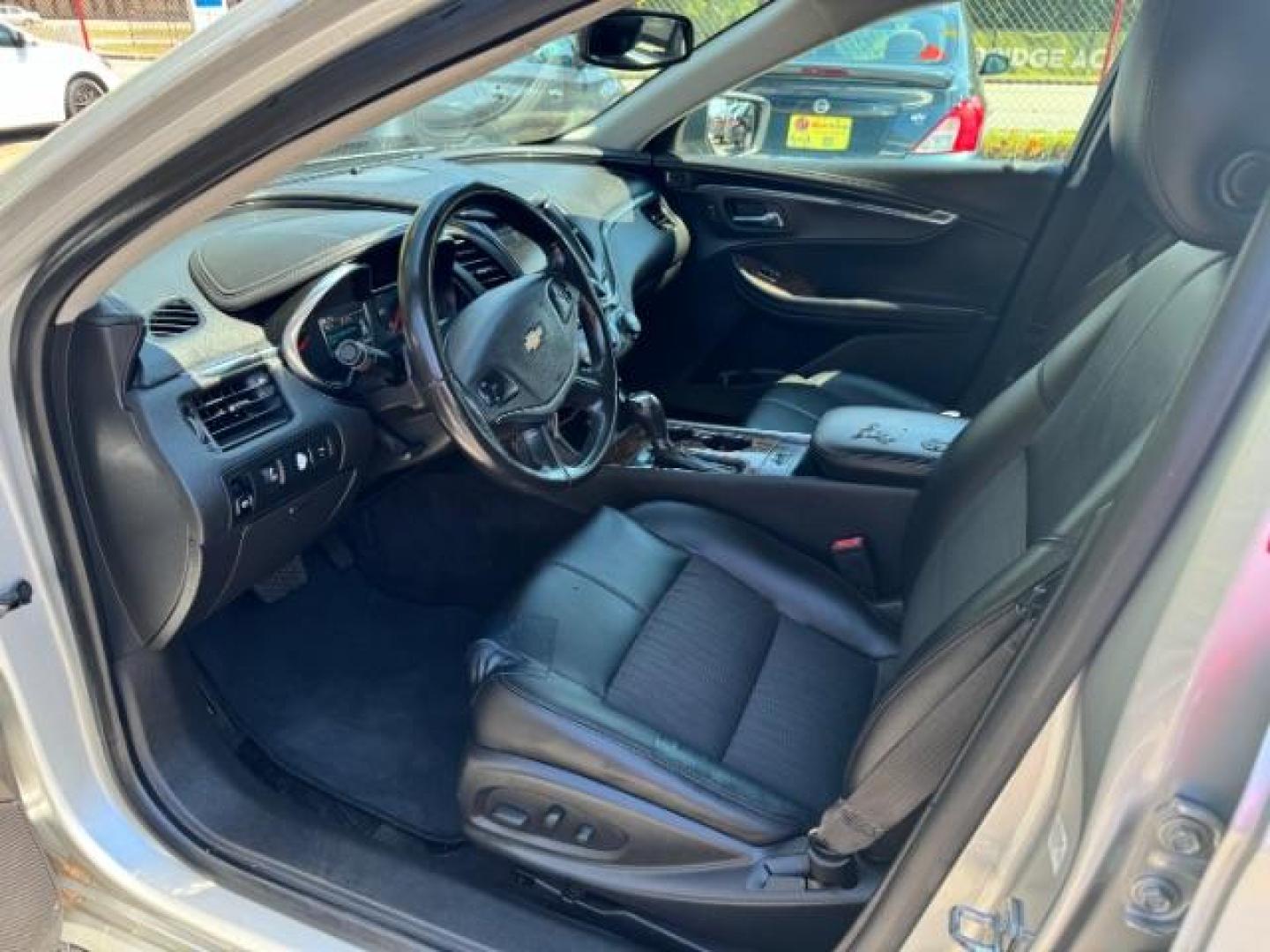 2014 Silver Chevrolet Impala 1LT (2G1115SL5E9) with an 2.5L L4 DOHC 16V engine, 6-Speed Automatic transmission, located at 1806 Veterans Memorial Hwy SW, Austell, GA, 30168, (770) 944-9558, 33.817959, -84.606987 - Photo#5