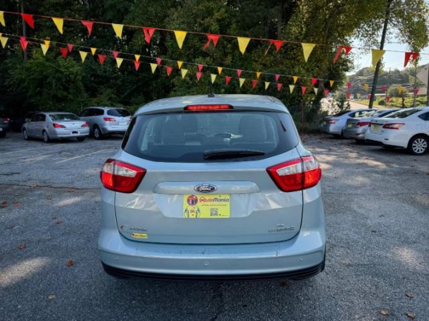 2013 Blue Ford C-Max Hybrid SE (1FADP5AU2DL) with an 2.0L L4 DOHC 16V HYBRID engine, Continuously Variable Transmission transmission, located at 1806 Veterans Memorial Hwy SW, Austell, GA, 30168, (770) 944-9558, 33.817959, -84.606987 - Photo#3