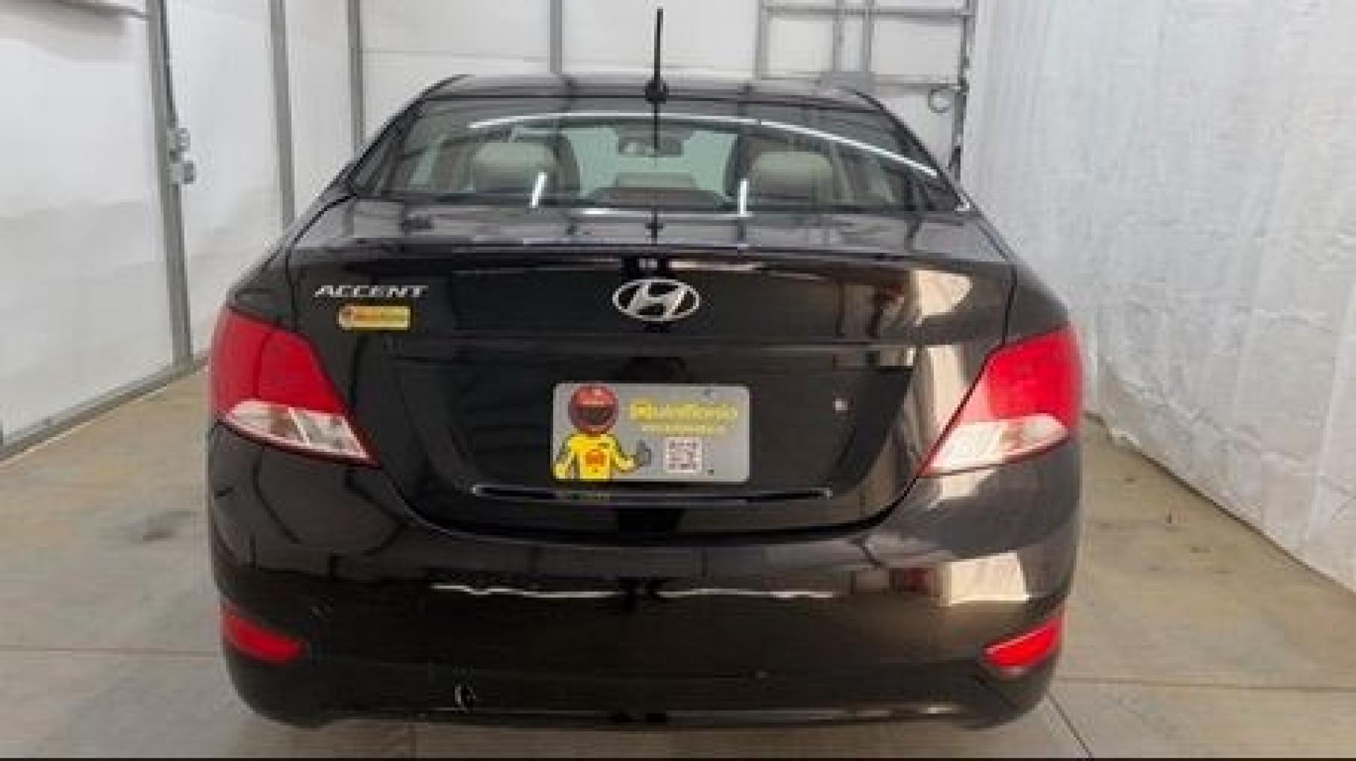 2017 Black Hyundai Accent SE 4-Door 6A (KMHCT4AE7HU) with an 1.6L L4 DOHC 16V engine, 6-Speed Automatic transmission, located at 1806 Veterans Memorial Hwy SW, Austell, GA, 30168, (770) 944-9558, 33.817959, -84.606987- Photo#4
