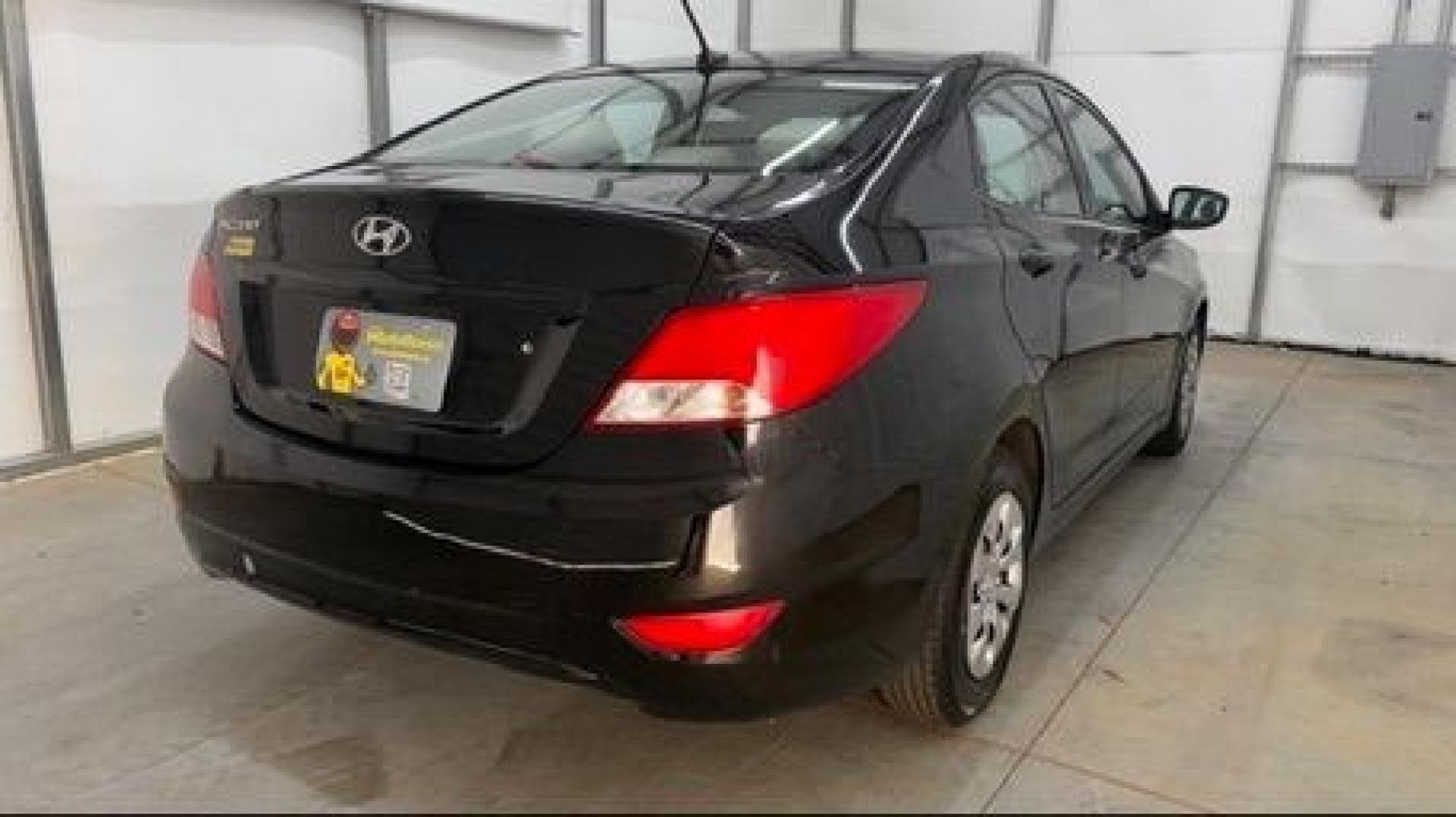 2017 Black Hyundai Accent SE 4-Door 6A (KMHCT4AE7HU) with an 1.6L L4 DOHC 16V engine, 6-Speed Automatic transmission, located at 1806 Veterans Memorial Hwy SW, Austell, GA, 30168, (770) 944-9558, 33.817959, -84.606987- Photo#5