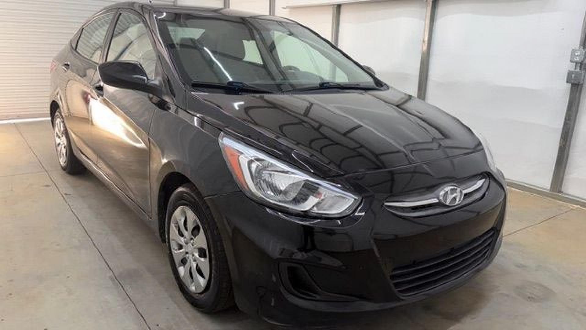 2017 Black Hyundai Accent SE 4-Door 6A (KMHCT4AE7HU) with an 1.6L L4 DOHC 16V engine, 6-Speed Automatic transmission, located at 1806 Veterans Memorial Hwy SW, Austell, GA, 30168, (770) 944-9558, 33.817959, -84.606987- Photo#8