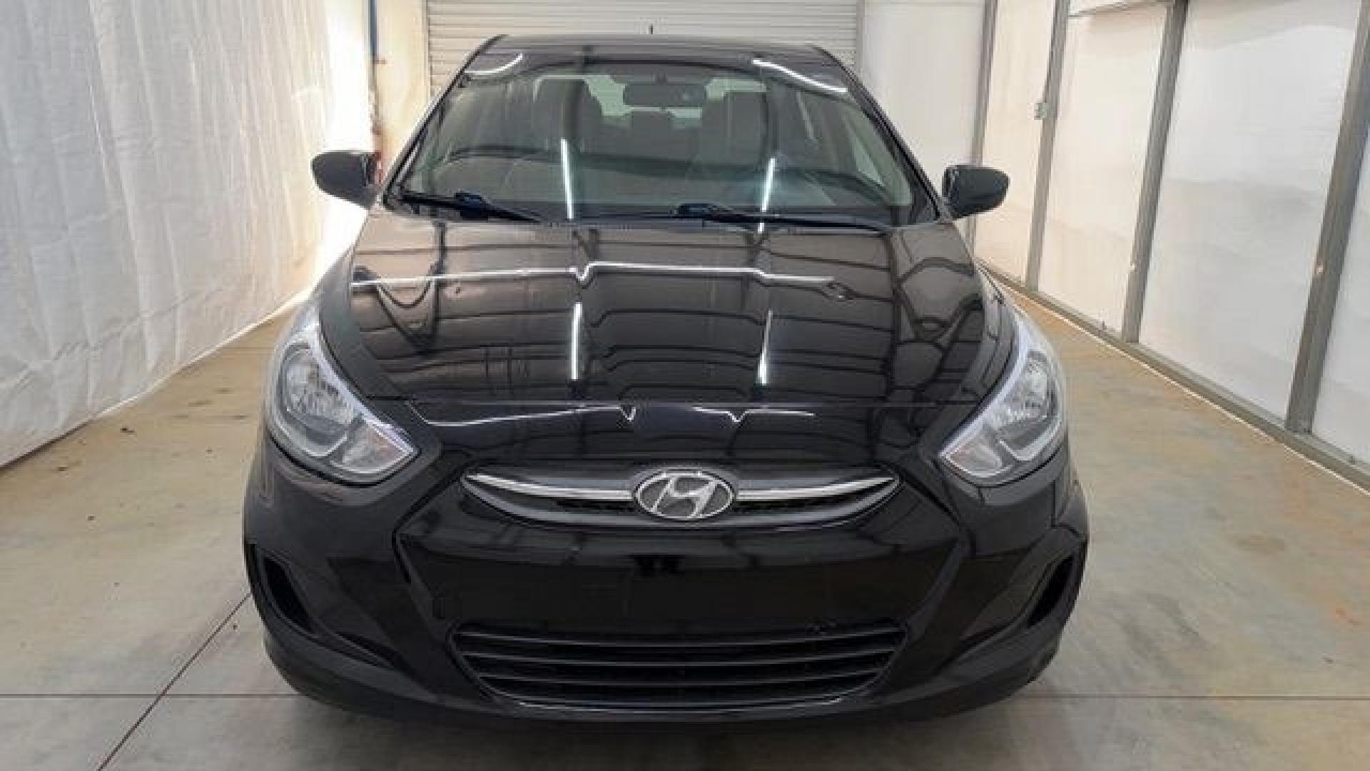 2017 Black Hyundai Accent SE 4-Door 6A (KMHCT4AE7HU) with an 1.6L L4 DOHC 16V engine, 6-Speed Automatic transmission, located at 1806 Veterans Memorial Hwy SW, Austell, GA, 30168, (770) 944-9558, 33.817959, -84.606987- Photo#9