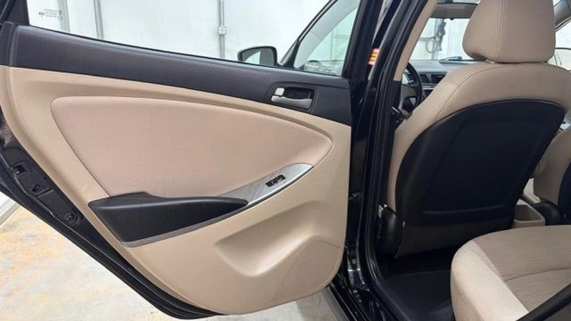 2017 Black Hyundai Accent SE 4-Door 6A (KMHCT4AE7HU) with an 1.6L L4 DOHC 16V engine, 6-Speed Automatic transmission, located at 1806 Veterans Memorial Hwy SW, Austell, GA, 30168, (770) 944-9558, 33.817959, -84.606987- Photo#13